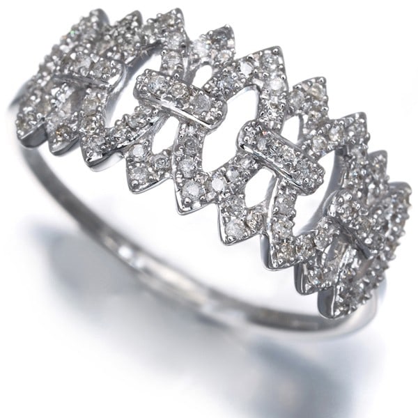 Diamond 0.23Ct Openwork Ring 18K 750 White Gold: Diamond 0.23Ct Openwork Ring 18K 750 White Gold The 0.23Ct diamond openwork ring features a natural diamond set in an 18k white gold band, showcasing intricate details and craftsmanship. This