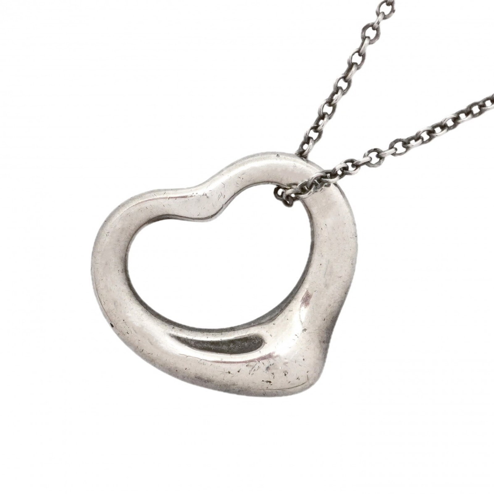 Women's Sterling Silver 925 Tiffany Co.: Women's Sterling Silver 925 Tiffany Co. Sterling silver necklace from Tiffany Co., featuring a 14mm x 15.7mm pendant, measures 45 cm in circumference, and bears the hallmark of 925. The piece has
