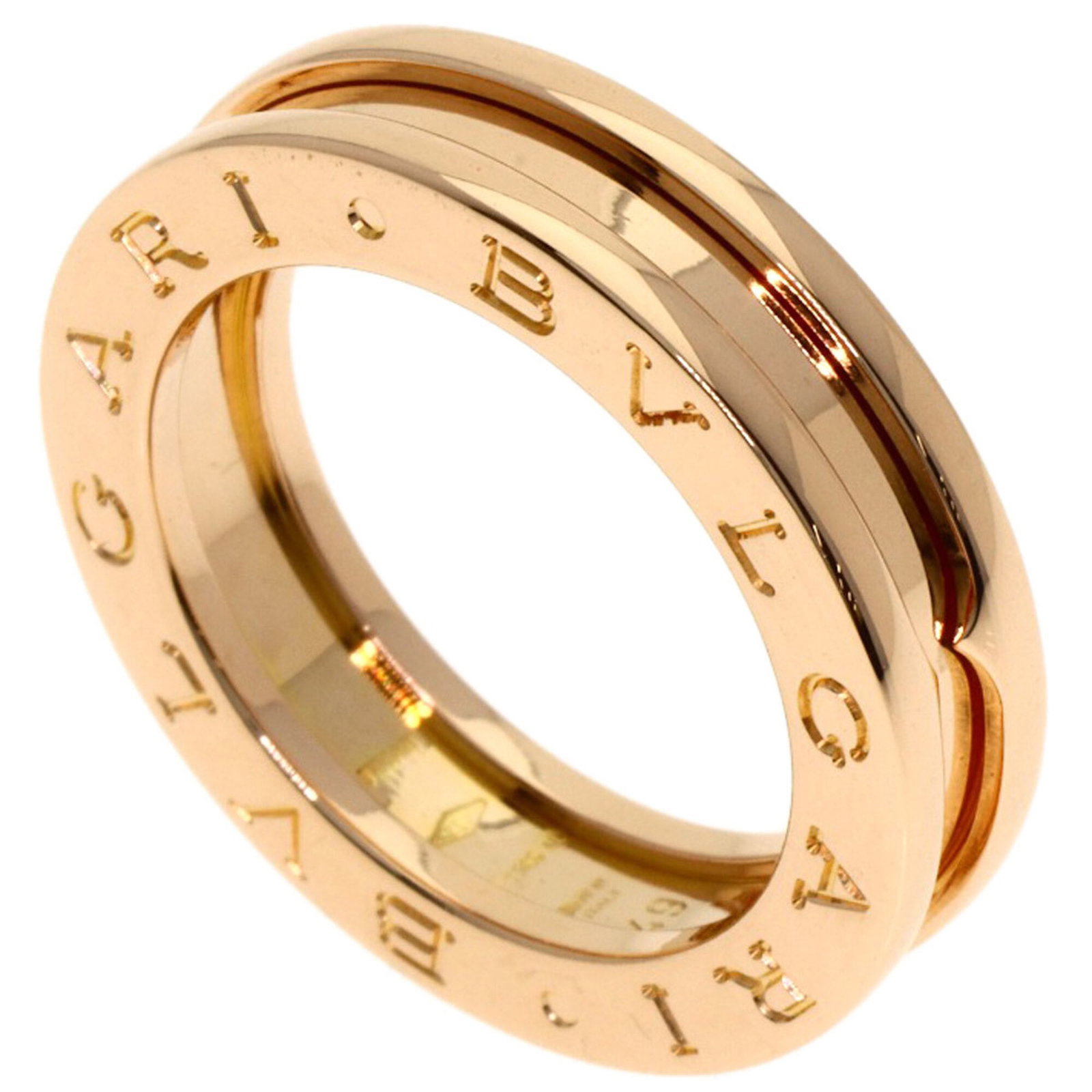 Pink Gold 18K Bvlgari Band Ring: Pink Gold 18K Bvlgari Band Ring Pink Gold 18K Bvlgari Band Ring features a luxurious pink gold design, showcasing the brand's signature style. This used band ring has hardly any traces of usage and