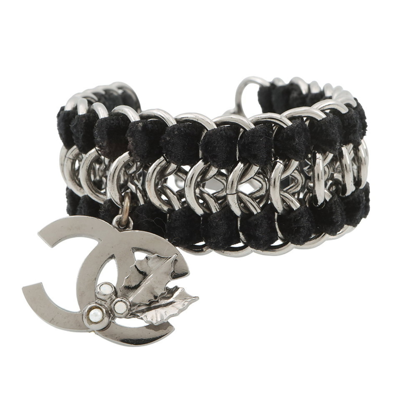 Metal velvet bracelet by Chanel: Metal velvet bracelet by Chanel Metal velvet bracelet by Chanel, featuring artificial pearl and rhinestone accents in black and silver tones. This 16.5cm charm bracelet boasts a luxurious metal velvet