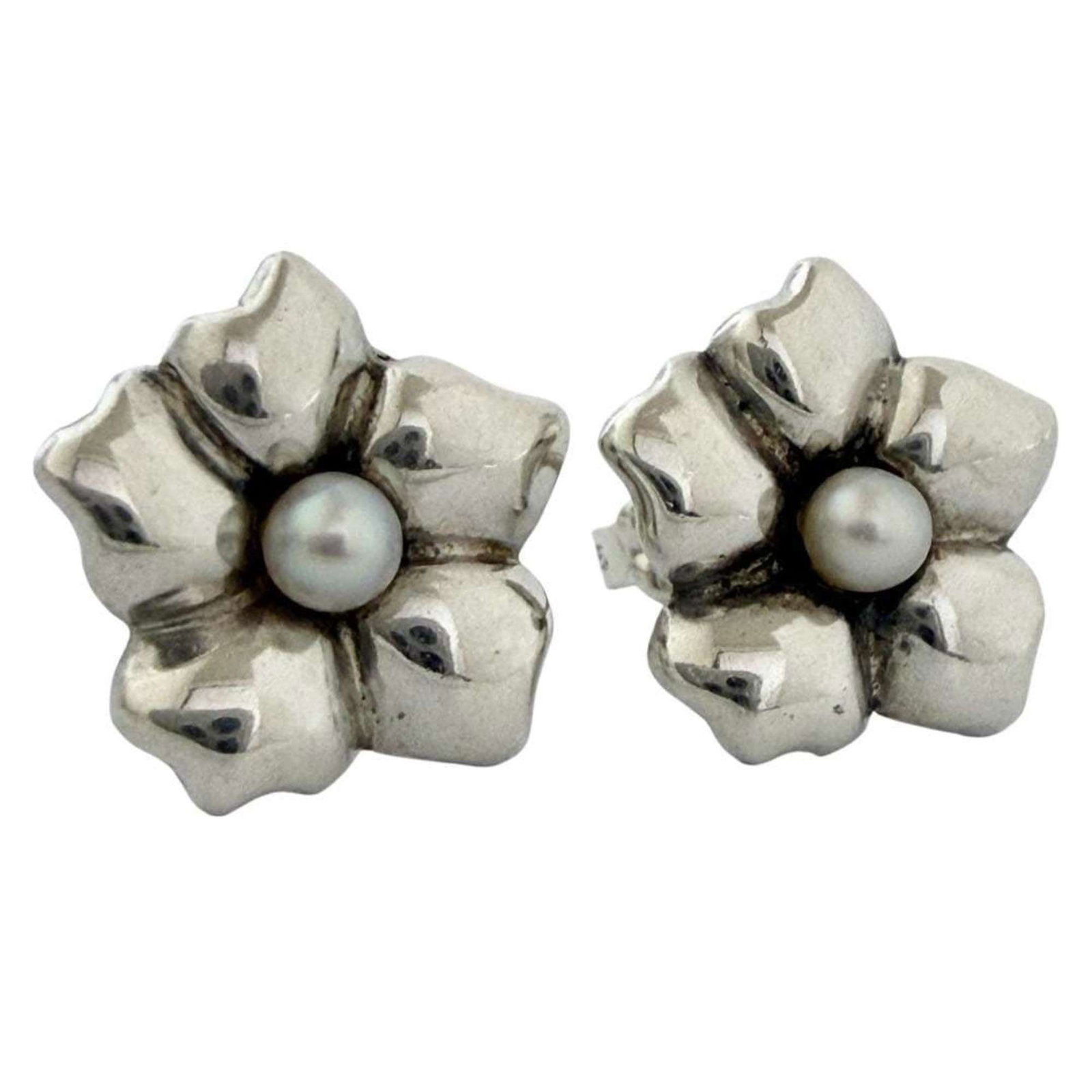 Metal Stud Earrings Tiffany: Metal Stud Earrings Tiffany Metal Stud Earrings Tiffany are made from metal and feature a stud design. They bear a signature, indicating the work has been signed by an artist. The earrings are in very
