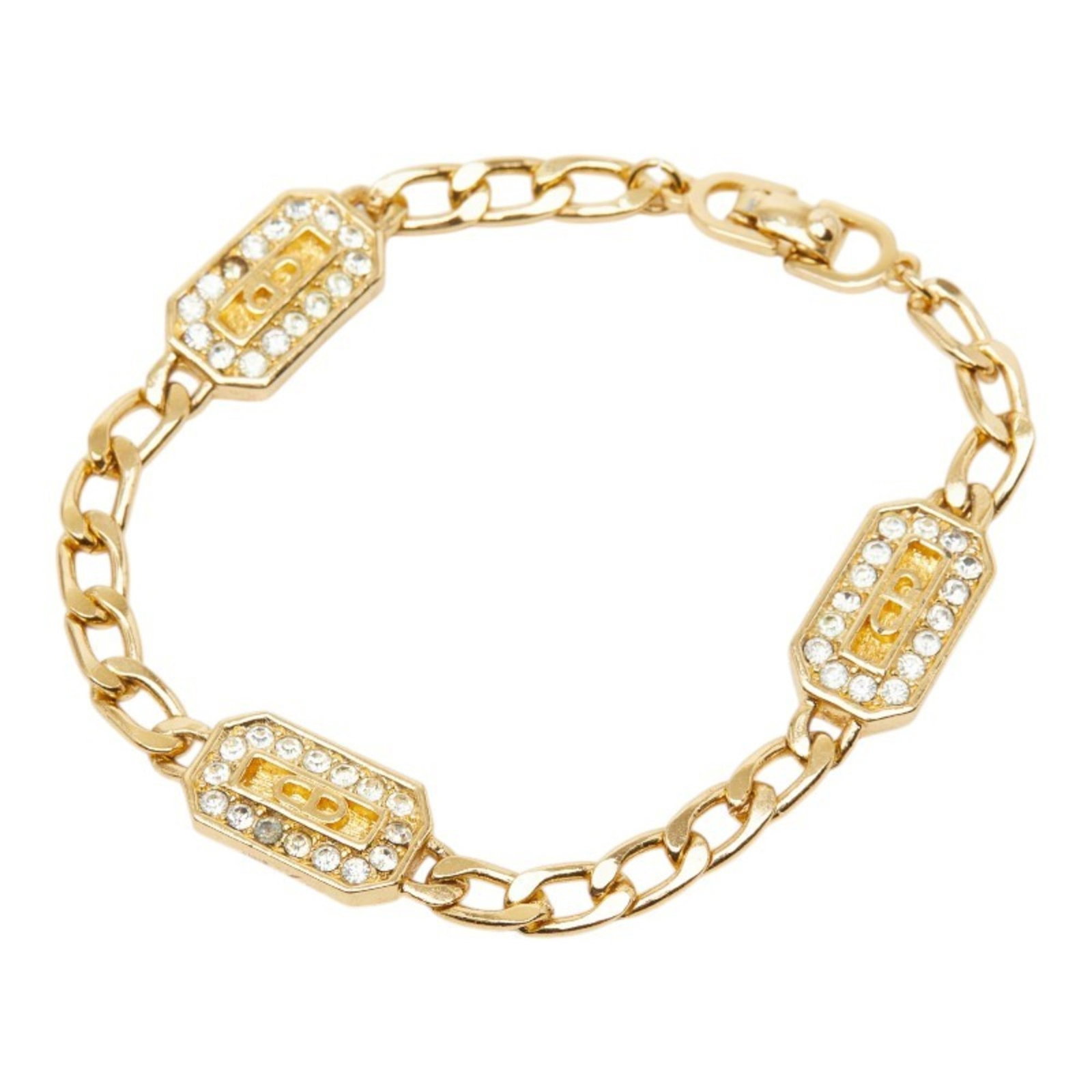 Dior Charm Rhinestone Christian: Dior Charm Rhinestone Christian Christian Dior Charm Rhinestone Necklace in Gold. This 17cm gold charm bracelet features rhinestones and bears a signature, with traces of usage and minor scratches vis