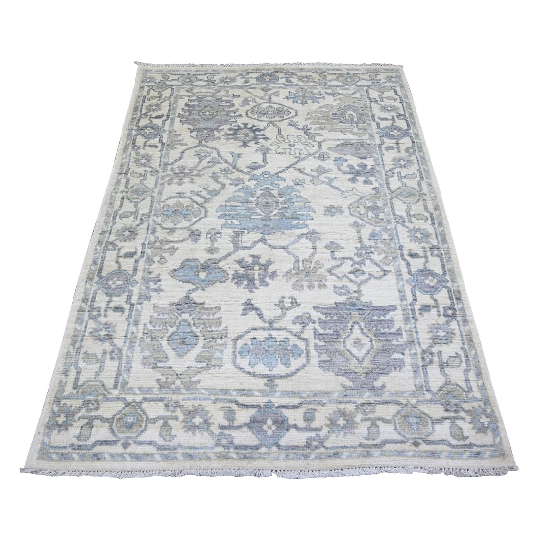 4'x6' Ivory Wool Hand Knotted Afghan Angora Oushak Rug: 4'x6' Ivory Wool Hand Knotted Afghan Angora Oushak Rug Hand-knotted with intricate wool, this 4'x6' Oushak rug boasts an elegant ivory color and subtle gray undertones. Its rectangular field features
