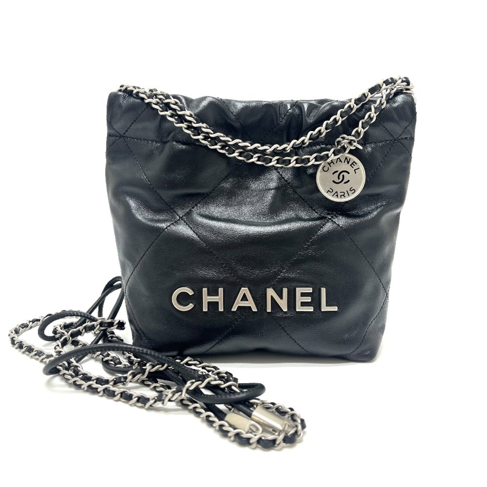 Shoulder Bag Leather by Chanel: Shoulder Bag Leather by Chanel Black leather shoulder bag by Chanel, featuring a timeless design with clean lines and classic style. The bag measures 19cm x 17cm x 6.5cm and is in mint condition,