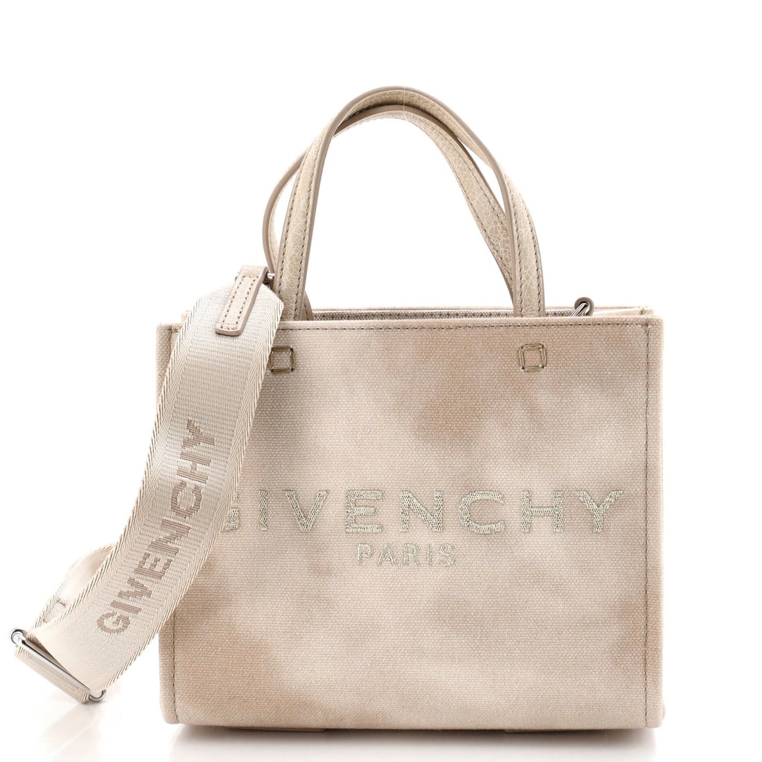 G Tote Mini Canvas By Givenchy: G Tote Mini Canvas By Givenchy The Givenchy G Tote Mini Canvas features a neutral exterior with canvas material, measuring 6.5" tall and 7" wide, making it a compact yet stylish accessory. Minor imper