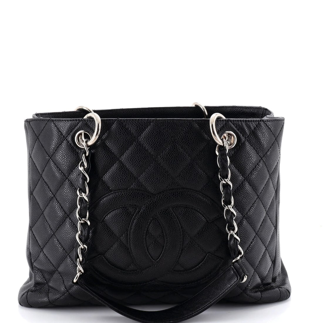 Caviar quilted shopping tote Chanel grand: Caviar quilted shopping tote Chanel grand Black quilted Caviar exterior leather Chanel Grand shopping tote with silver hardware, featuring a classic design and timeless style. The tote's exterior show
