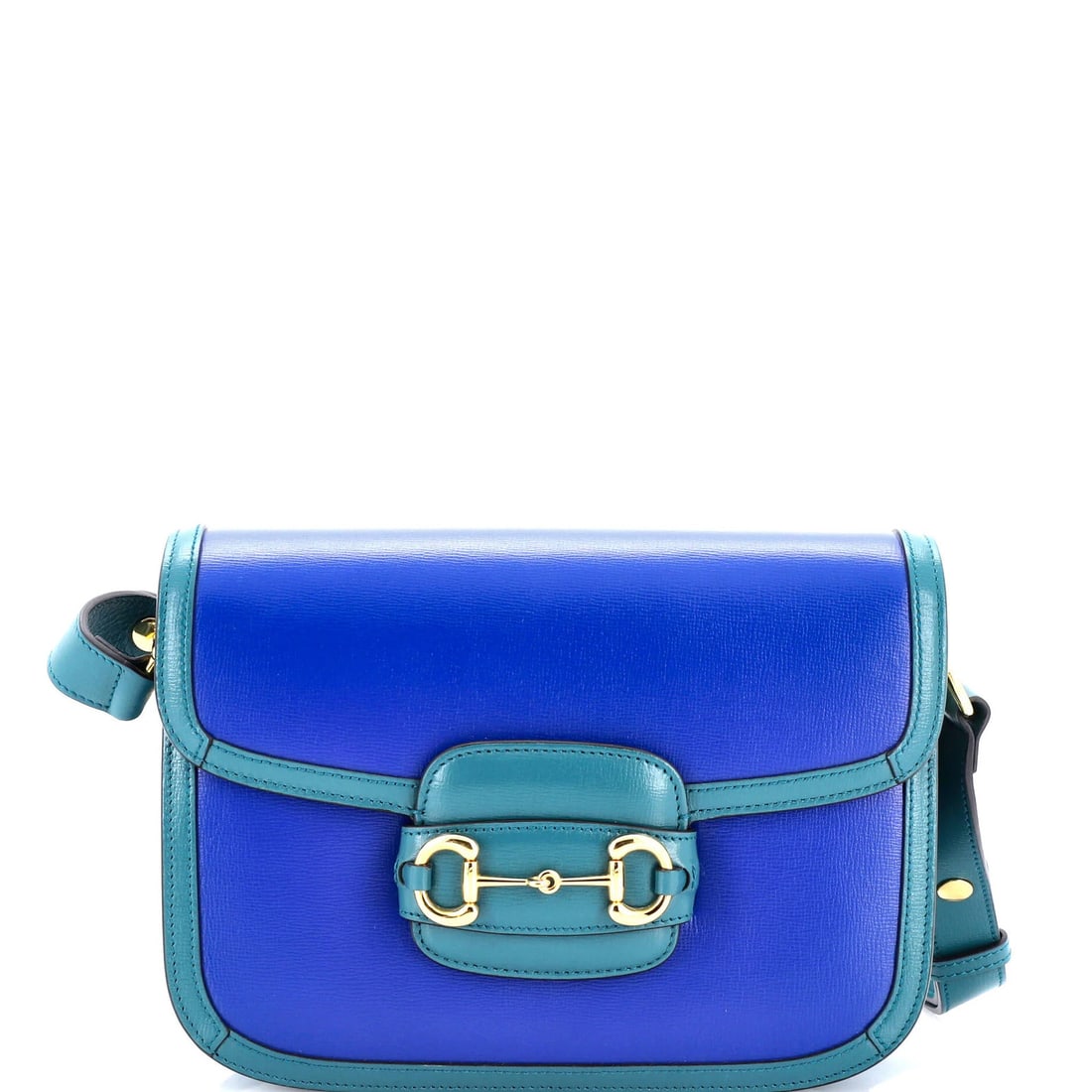 Small leather bag 1955 Gucci Horsebit shoulder: Small leather bag 1955 Gucci Horsebit shoulder Small leather bag with iconic Horsebit detail from Gucci's 1955 collection, featuring a classic blue exterior and neutral interior. Minor scuffs on the