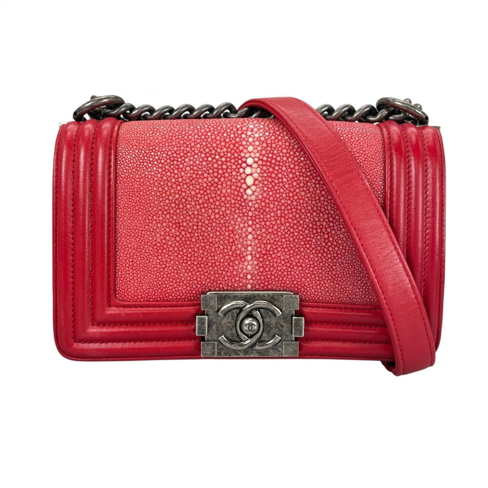 Shoulder Bag Leather: Shoulder Bag Leather This iconic Chanel shoulder bag is crafted from luxurious lambskin leather in a bold, eye-catching red hue. With its classic design and timeless elegance, it's a statement piece