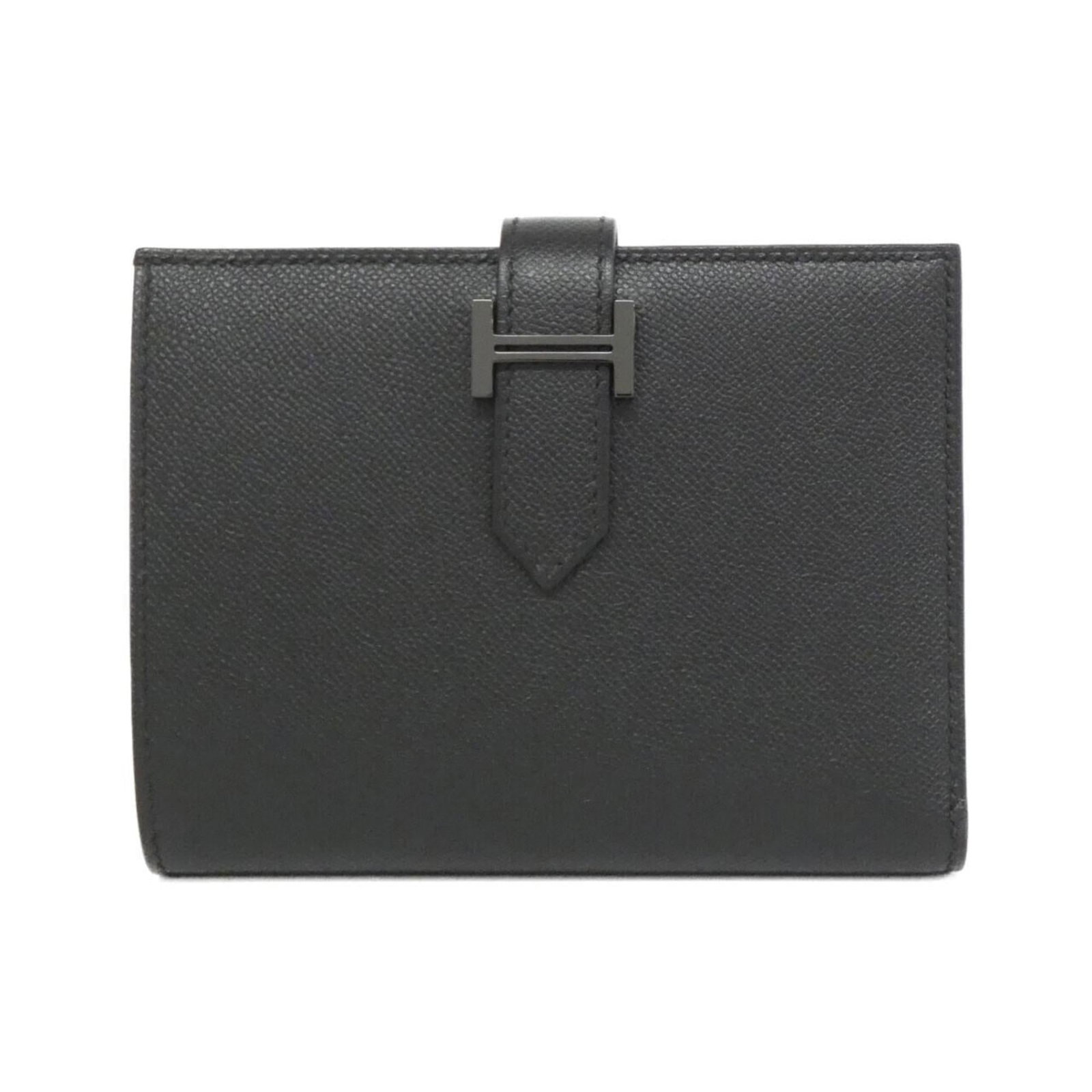 Hermes Wallet (Bi-Fold): Hermes Wallet (Bi-Fold) A classic bi-fold wallet from the renowned French fashion house, featuring a timeless design and understated elegance. With its sleek black finish and compact size, this Hermes