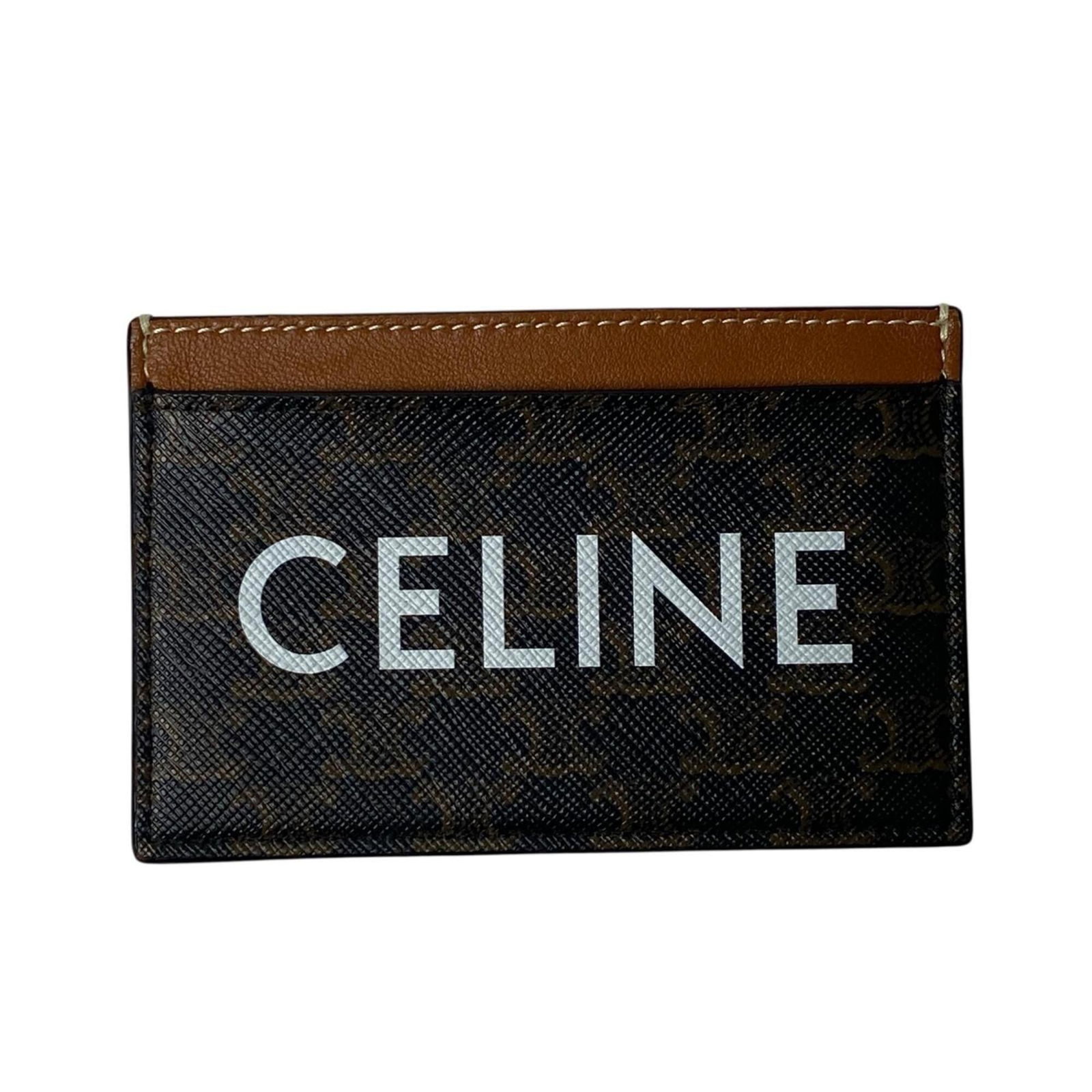 Card case leather Celine: Card case leather Celine This brown leather card case from Celine features a classic design with subtle scratches and scuffs, giving it a well-worn look. Made from high-quality leather, the case has