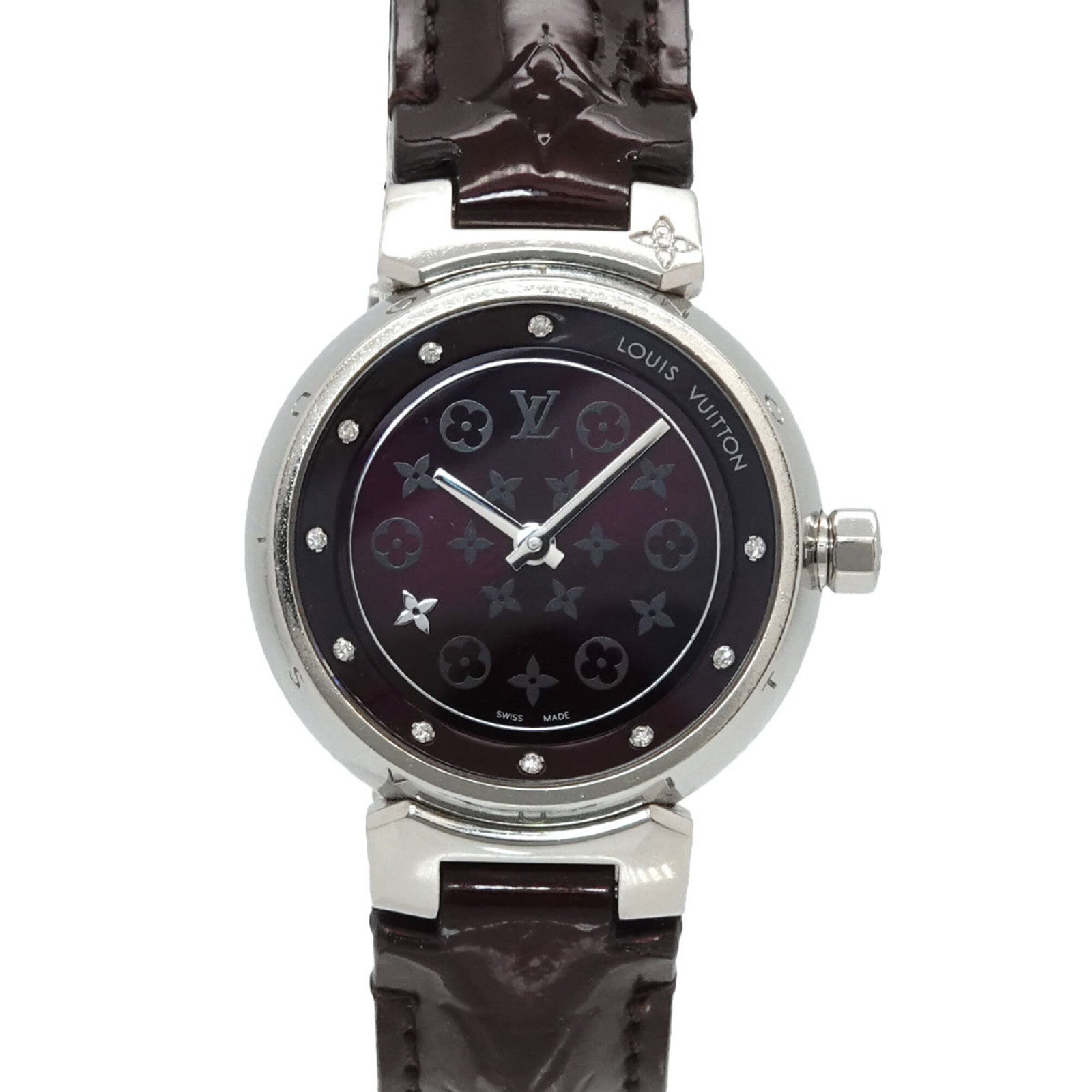 Louis Vuitton Wristwatch: Louis Vuitton Wristwatch Stainless steel case and leather band make for a sleek, modern look. The black dial stands out against the subtle sheen of the metal, adding to the watch's sophisticated