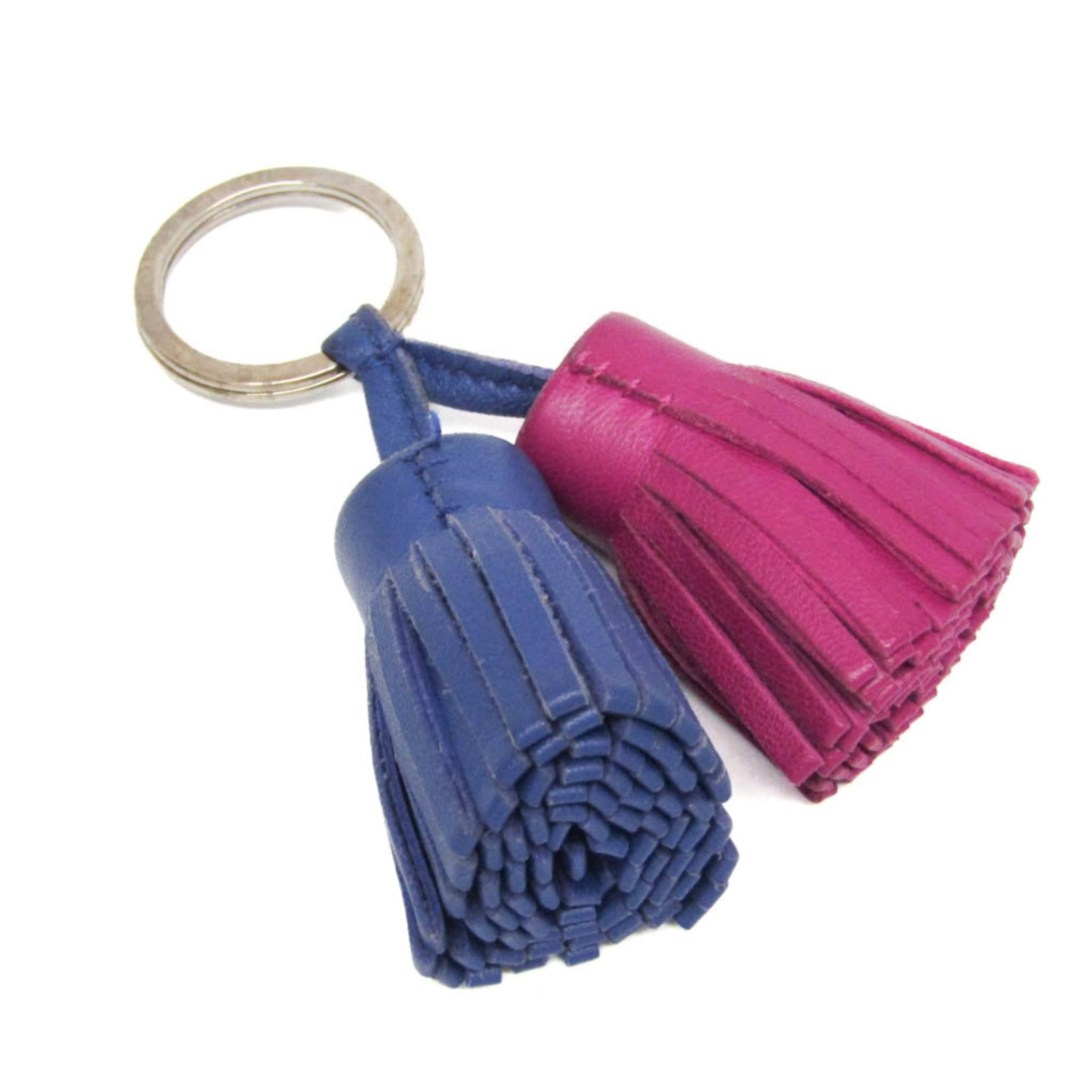 Agneau Keyring Hermes Milo: Agneau Keyring Hermes Milo Agneau Keyring Hermes Milo is a unique accessory featuring the iconic Agneau Milo material, known for its soft and supple texture. This keyring boasts a navy color with
