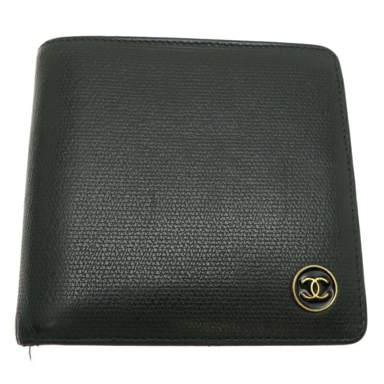 Chanel Wallet (Bi-Fold) Leather: Chanel Wallet (Bi-Fold) Leather Black Chanel bi-fold leather wallet with traces of usage and minor scratches, offering a classic and timeless design. Made from high-quality leather, its compact size