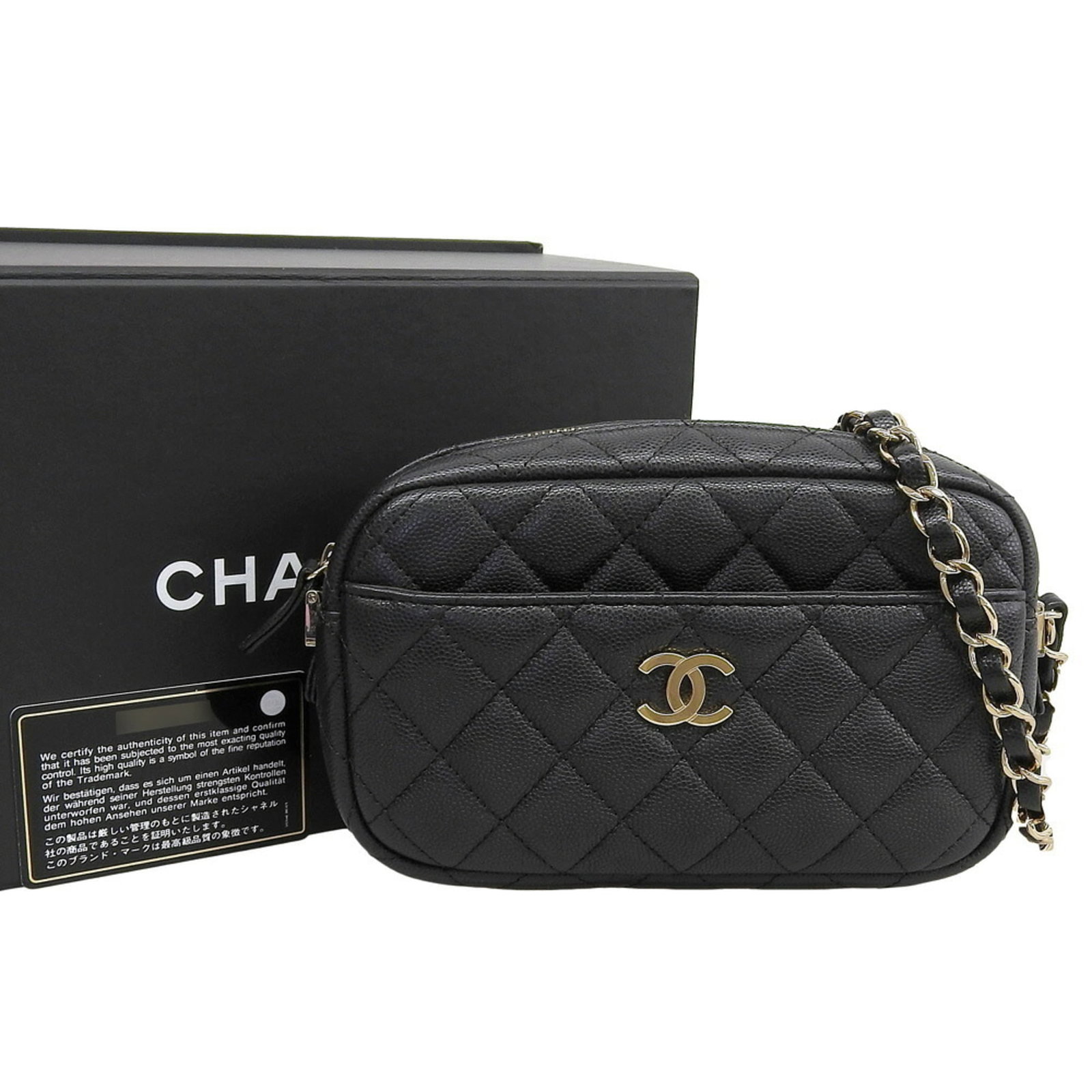 Calfskin shoulder bag by Chanel: Calfskin shoulder bag by Chanel Calfskin shoulder bag by Chanel, featuring grained calfskin material and a classic design. Black in color with some traces of usage visible, including minor scratches