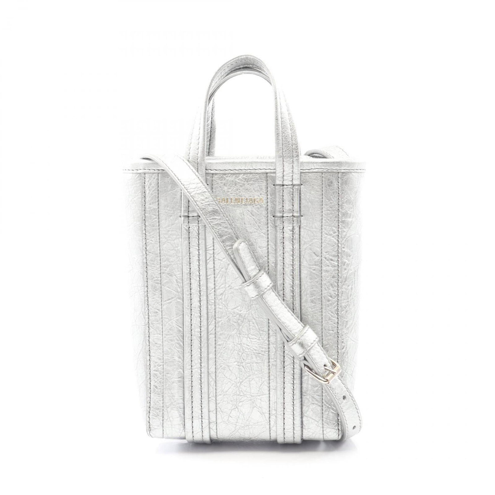 Shoulder bag leather from Balenciaga: Shoulder bag leather from Balenciaga This silver leather shoulder bag from Balenciaga features a sleek design with clean lines and a compact size. Made from high-quality leather, it has developed a