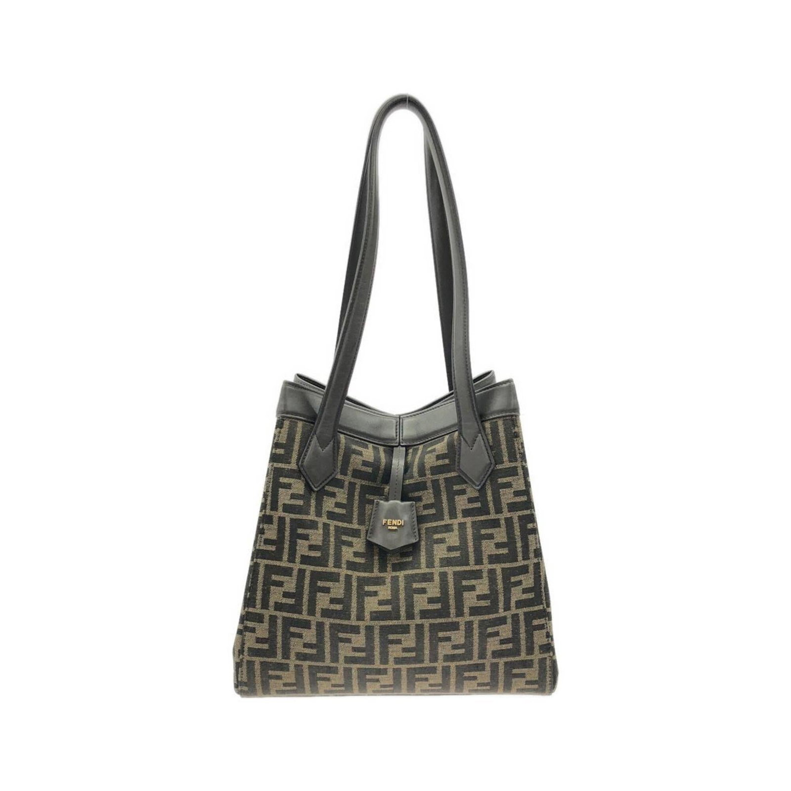 Fendi Shoulder Bag Canvas Leather: Fendi Shoulder Bag Canvas Leather Canvas and leather come together in this Fendi shoulder bag, featuring calfskin leather accents. The gold hardware adds a touch of luxury to this stylish design. With