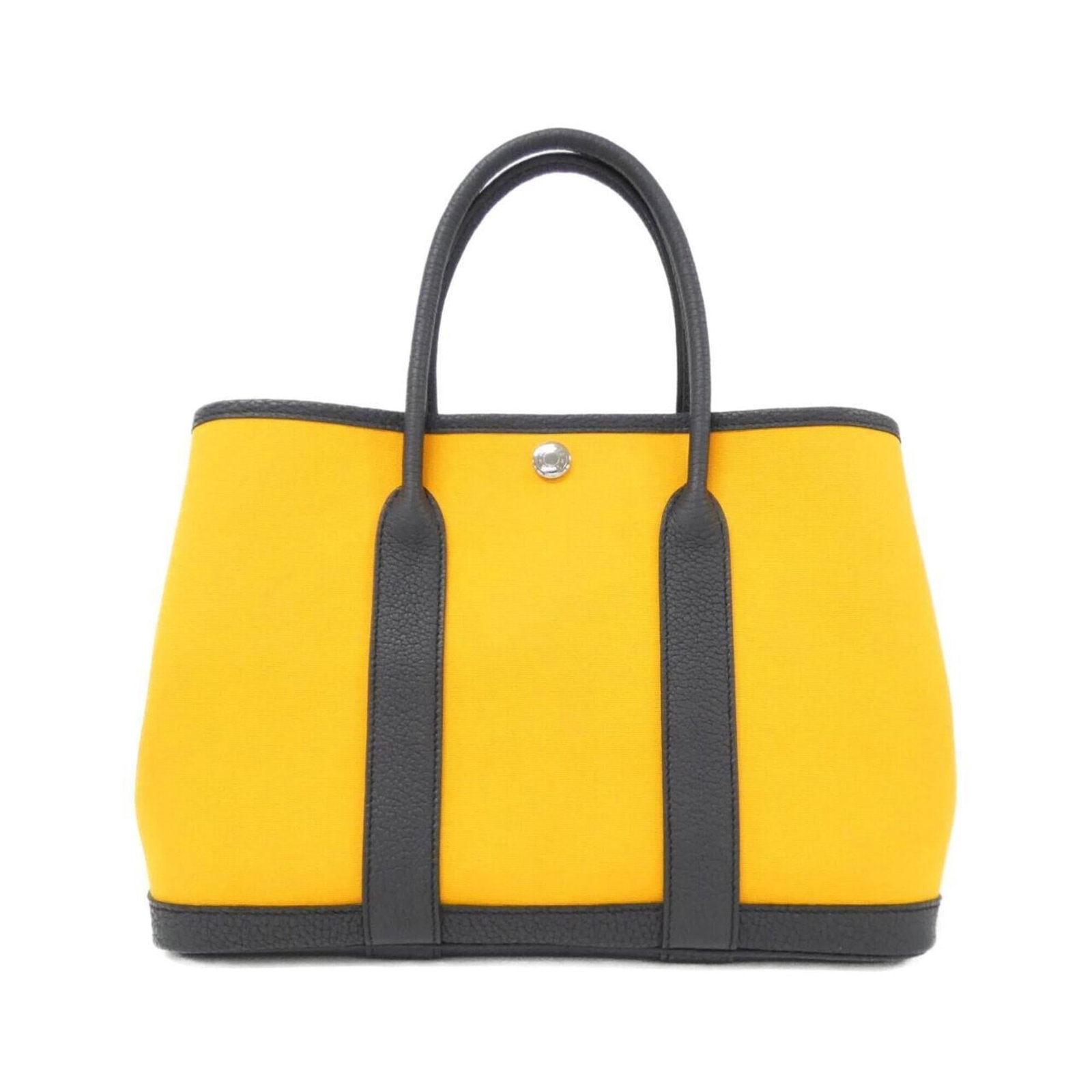 Hermes Handbag Toile Officier Negonda Leather: Hermes Handbag Toile Officier Negonda Leather Toile Officier Negonda Leather Handbag from Hermes, featuring a unique blue hue and a blend of vibrant colors. This pre-owned handbag boasts a classic