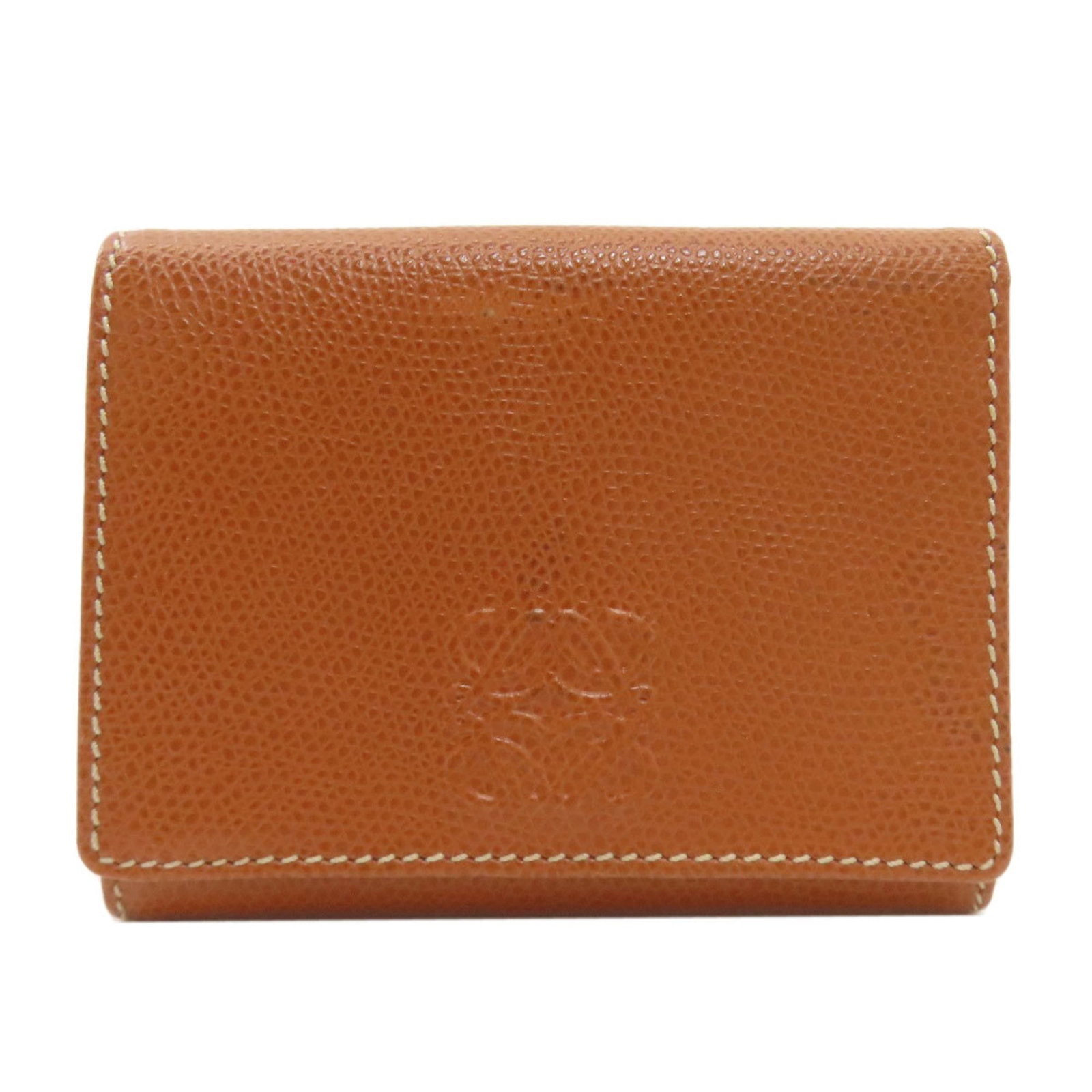 Leather Bi Fold Wallet Loewe: Leather Bi Fold Wallet Loewe Brown Leather Bi Fold Wallet from Loewe, measuring 9cm x 11cm x 1.5cm, features high-quality leather with a few traces of usage and minor scratches/dirt. This bi-fold