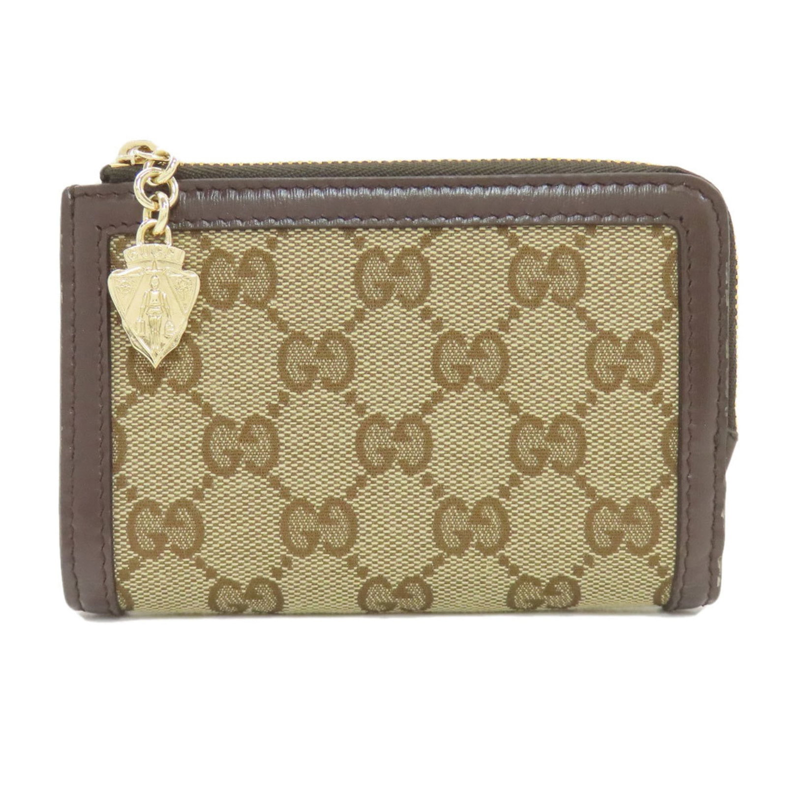 Canvas Bi Fold Wallet Gucci: Canvas Bi Fold Wallet Gucci Canvas Bi Fold Wallet Gucci - A Timeless Brown Leather Accessory. This pre-owned canvas bi-fold wallet from Gucci features a classic design with brown leather accents, meas
