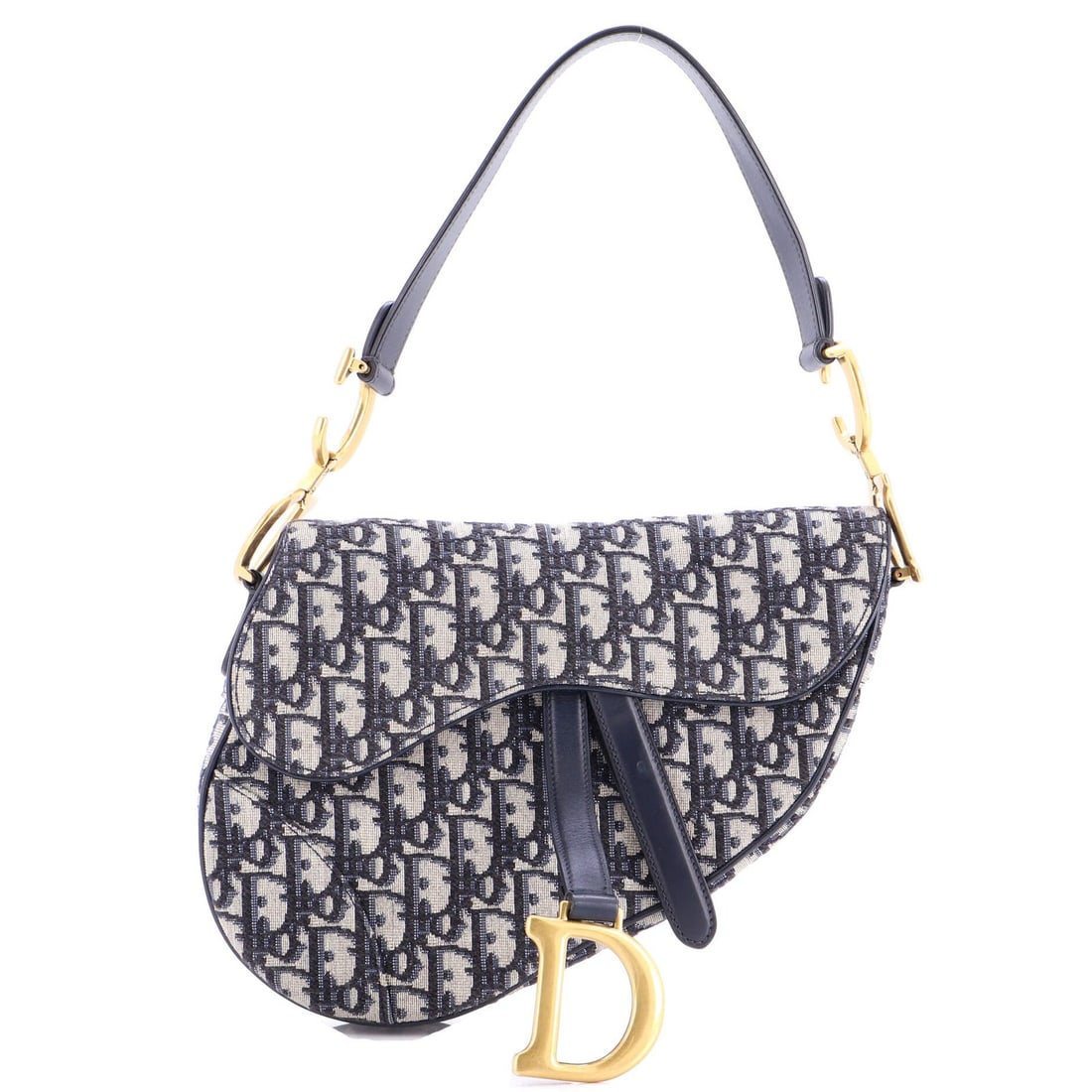 Canvas saddle handbag medium Christian Dior: Canvas saddle handbag medium Christian Dior Canvas saddle handbag medium from Christian Dior, featuring oblique canvas construction and a blue exterior. The bag measures 7" handle drop, 7.5" height, 1