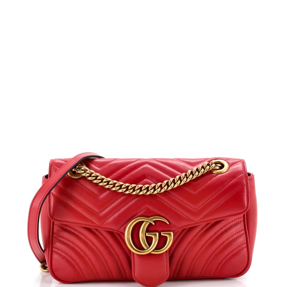 Gucci GG Flap Bag Small Matelasse Leather Marmont: Gucci GG Flap Bag Small Matelasse Leather Marmont Small Matelasse Leather Marmont Gucci GG Flap Bag in Red features a classic cross body design with a signature GG Marmont flap. The exterior boasts ma