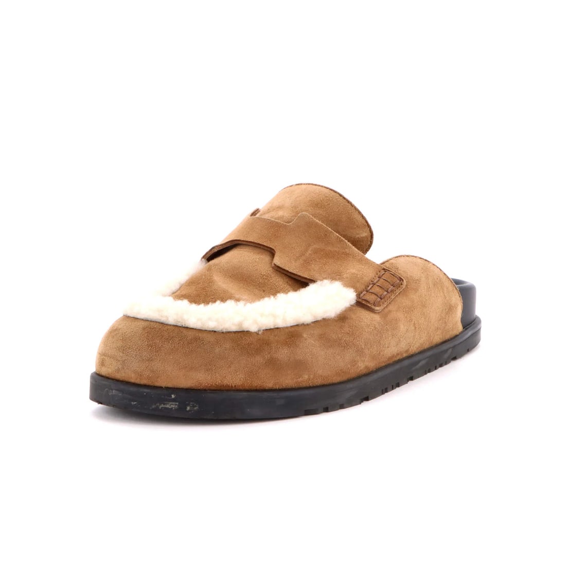 Shearling Suede Mules Go with Women's Hermes: Shearling Suede Mules Go with Women's Hermes Shearling suede mules with an unmistakable Hermes style, featuring a rich brown exterior and sleek black interior. The shoes boast a luxurious shearling up