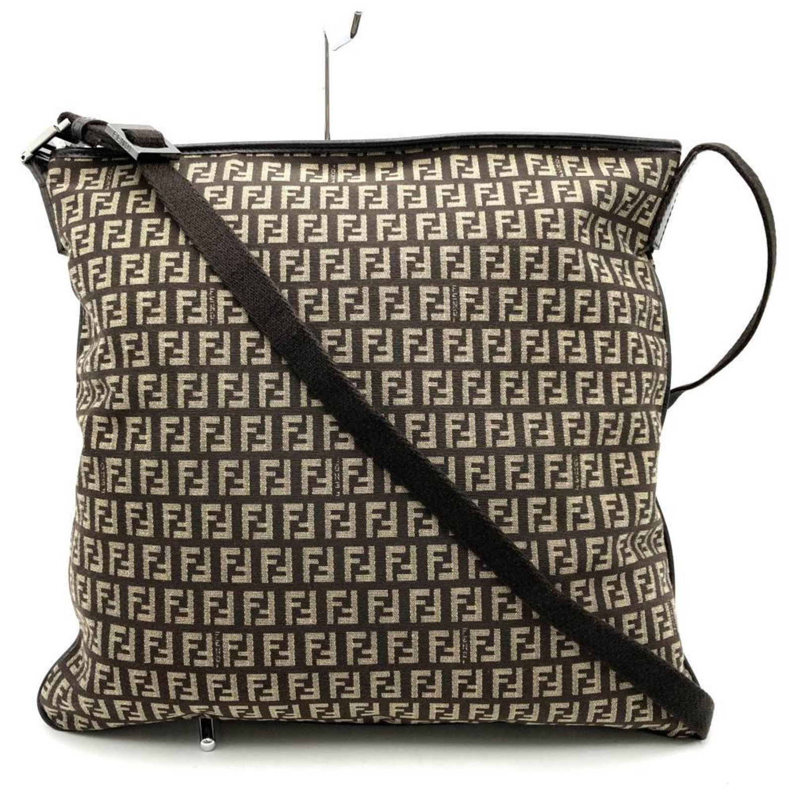 Shoulder Bag Canvas by Fendi: Shoulder Bag Canvas by Fendi Canvas shoulder bag by Fendi, featuring a classic design with brown canvas material and a sizeable 34cm x 37cm x 1cm dimensions. The bag has been used, showing traces of u