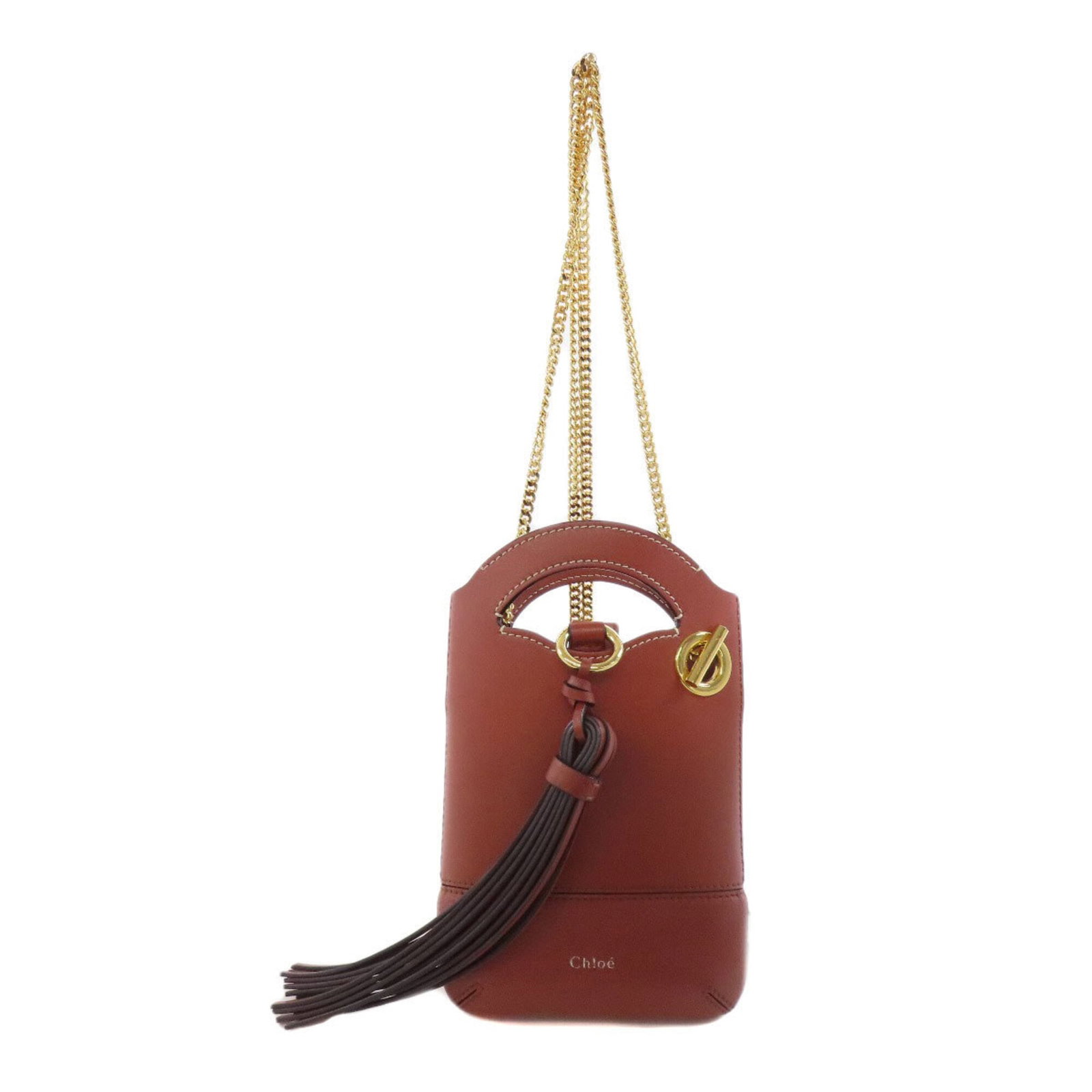 Shoulder bag leather: Shoulder bag leather Brown and Red Brown leather shoulder bag with scratches and dirt, bearing traces of usage. Made from genuine leather, this bag measures 18cm x 15cm x 4cm. Used condition, but