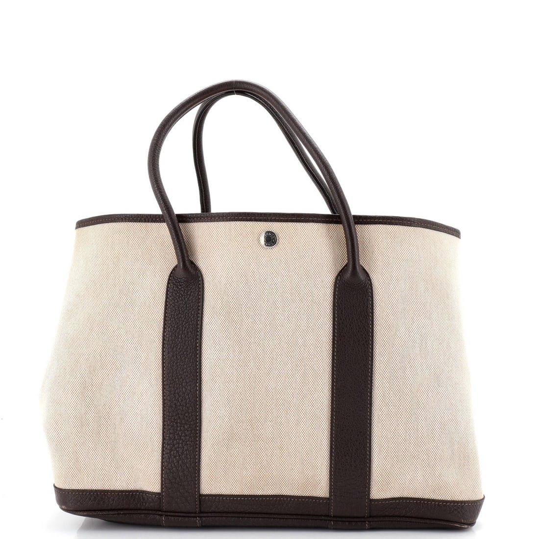 Toile Tote Leather and Garden Party By Hermes: Toile Tote Leather and Garden Party By Hermes Toile Tote Leather and Garden Party By Hermes, a classic canvas tote with a rich leather exterior in neutral brown tones. Measuring 36 inches tall and