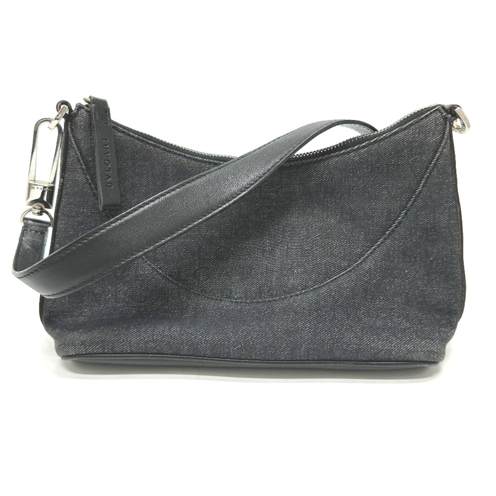 Bvlgari Handbag Other: Bvlgari Handbag Other Navy blue Bvlgari handbag with classic design, featuring a sturdy base and adjustable handle. Measuring 16cm x 23.5cm x 10cm, this versatile bag has seen some wear and tear, with