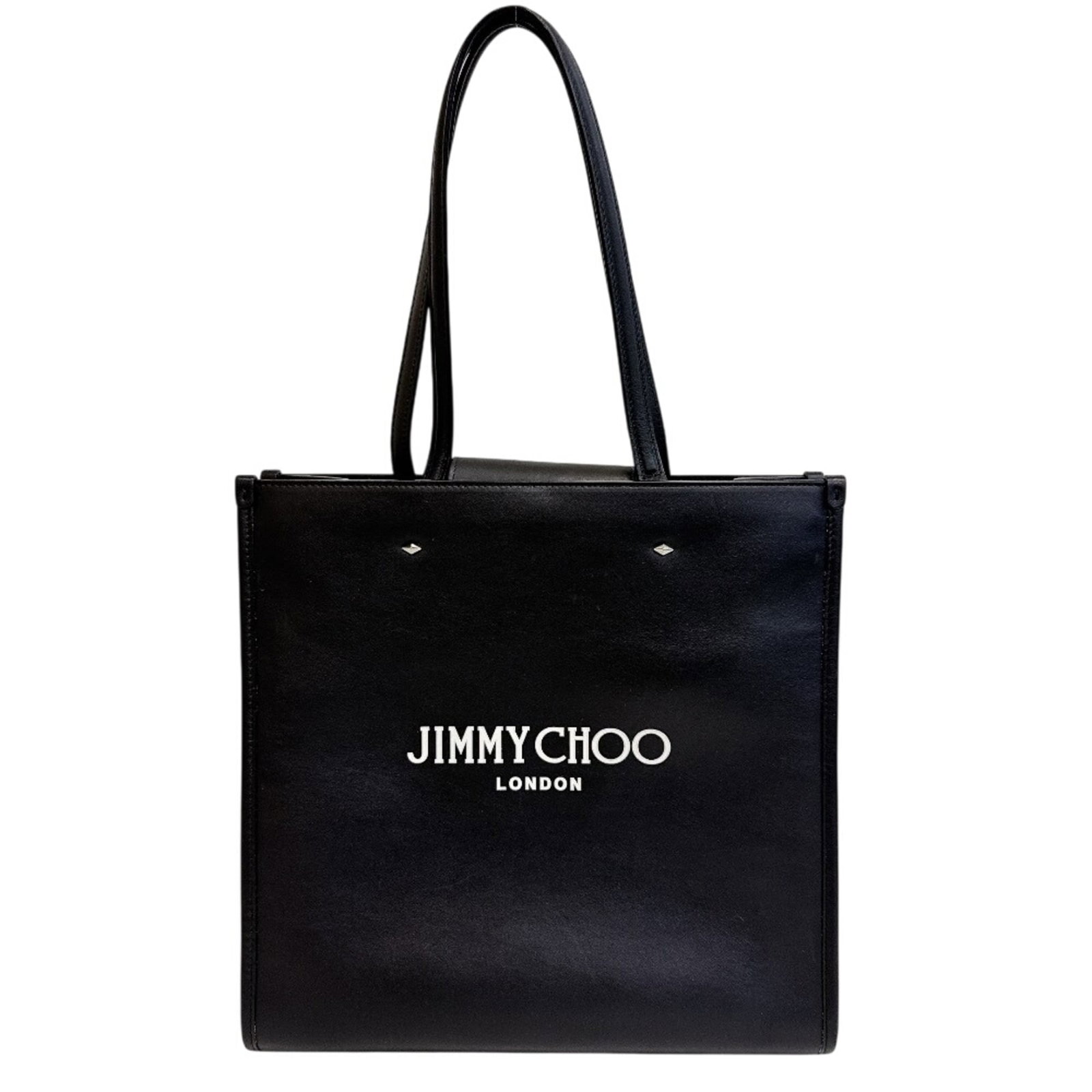 Jimmy Choo Tote Bag Leather: Jimmy Choo Tote Bag Leather Jimmy Choo's sleek black leather tote bag boasts a timeless design with clean lines and classic proportions. Measuring 30cm x 31cm x 6cm, it offers ample space for daily