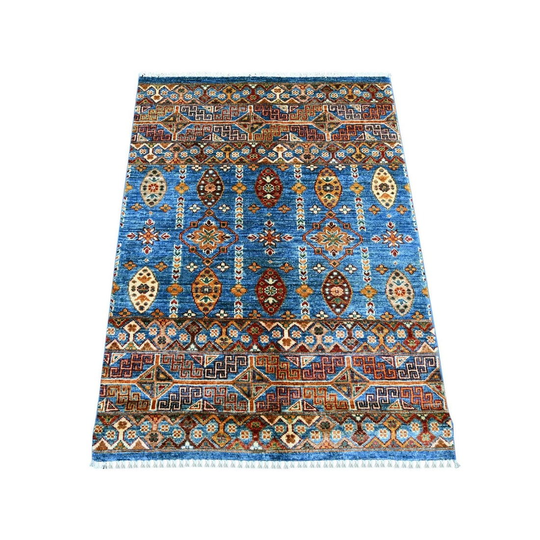 3'x4' Blue Afghan Super Kazak Hand Knotted Pure Wool Sample Mat Rug: 3'x4' Blue Afghan Super Kazak Hand Knotted Pure Wool Sample Mat Rug The Blue Afghan Super Kazak Hand Knotted Pure Wool Sample Mat Rug features an all-over regional design in a vibrant blue field,