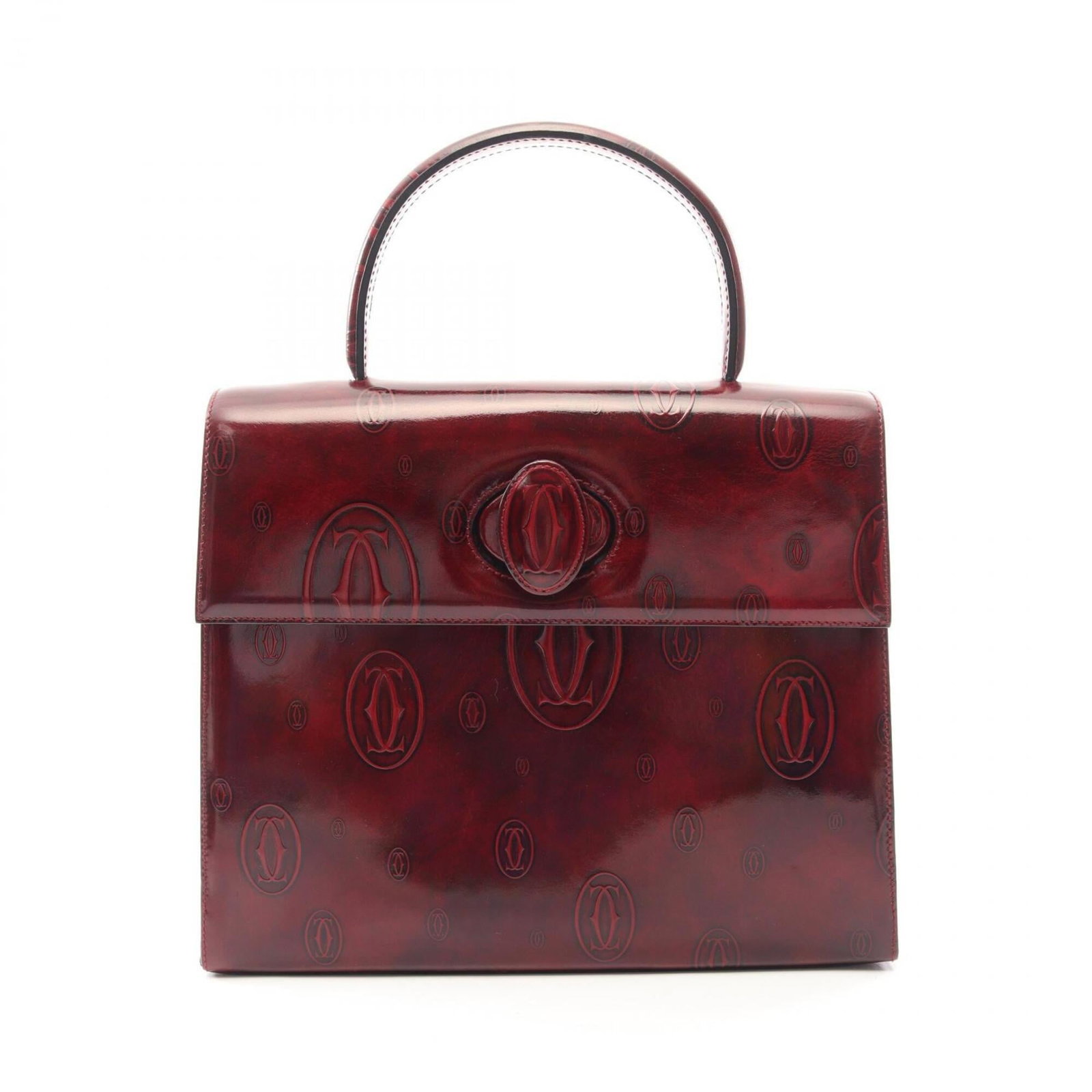 Handbag Leather by Cartier: Handbag Leather by Cartier Bordeaux leather handbag by Cartier, featuring a rich, luxurious finish with subtle signs of wear. Measuring 22cm x 28cm x 8.5cm, this used handbag boasts a classic design