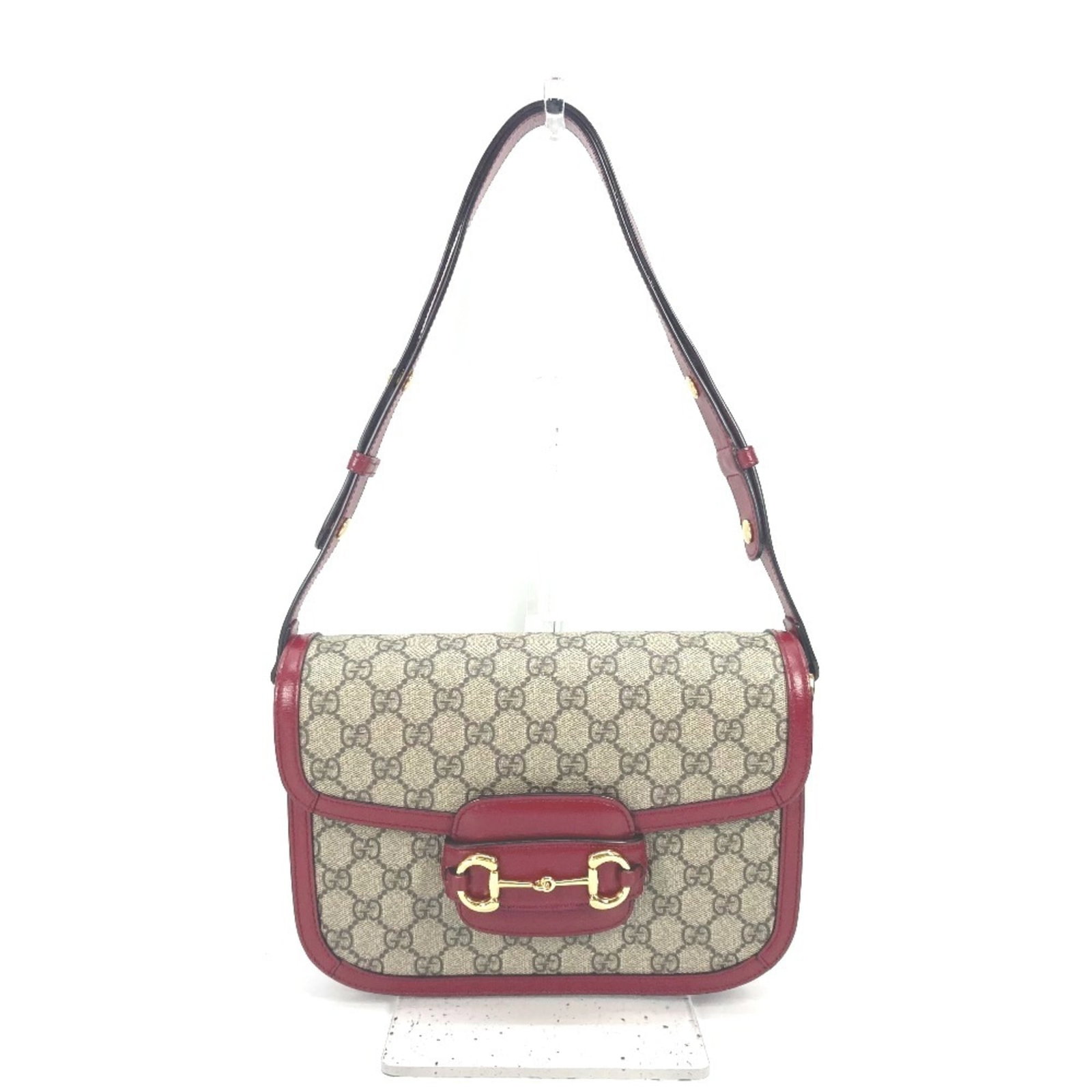 Supreme Leather Gg Bag Shoulder Gucci: Supreme Leather Gg Bag Shoulder Gucci Gucci's Supreme Leather Gg Bag is a statement piece in beige and red hues, boasting a unique design. Made from high-quality Gg Supreme leather, this shoulder bag 