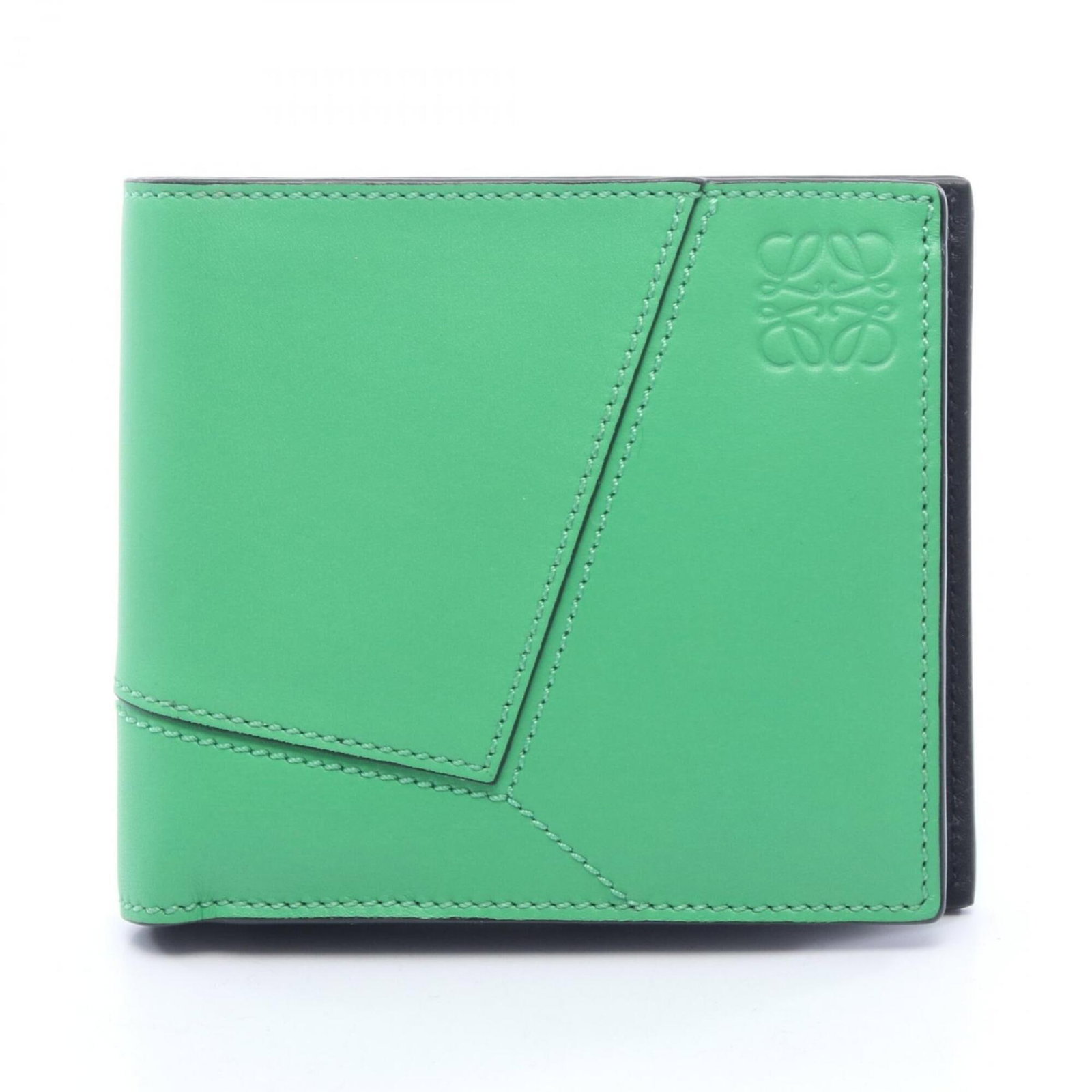 Leather Bi Fold Wallet Loewe: Leather Bi Fold Wallet Loewe This stunning Loewe leather bi-fold wallet features a rich green color and premium leather construction. With its classic design and compact size, it's perfect for