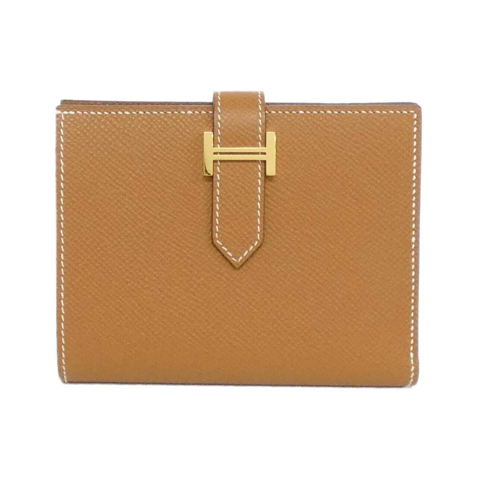 Epsom Leather Bi Fold Hermes Wallet: Epsom Leather Bi Fold Hermes Wallet Epsom Leather Bi Fold Wallet from Hermes, featuring a classic design with subtle scratches and minor dirt marks, showcasing the natural patina of well-used
