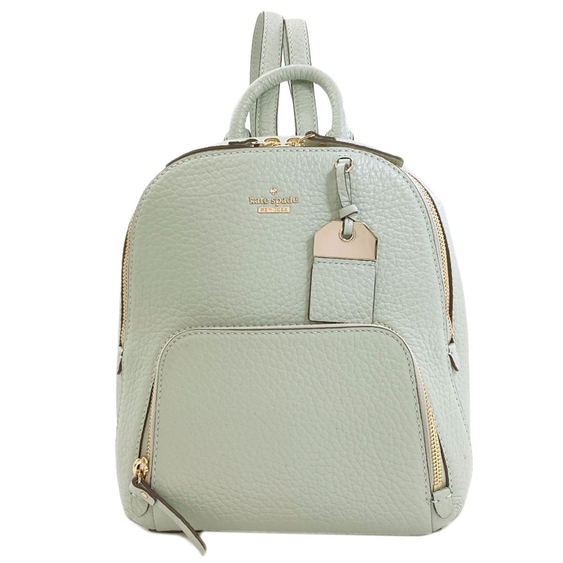 Kate Spade logo daypack leather backpack: Kate Spade logo daypack leather backpack Kate Spade logo daypack leather backpack in green, featuring high-quality exterior leather construction. The iconic brand's signature style and design make