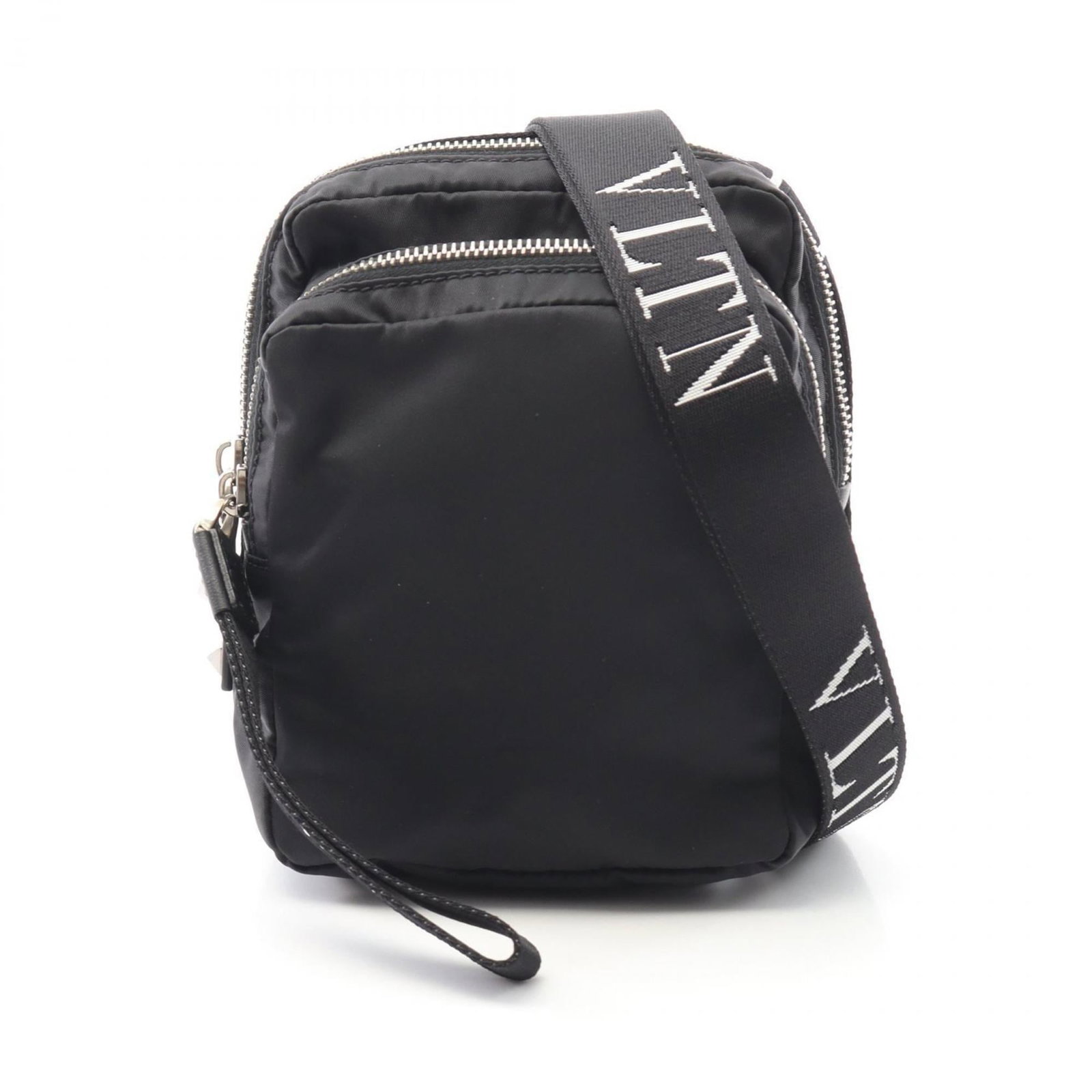 Valentino nylon shoulder bag: Valentino nylon shoulder bag Black Valentino nylon shoulder bag with a sleek design, measuring 16cm x 13cm x 5cm. The bag bears some minor scratches and dirt, but remains in very good condition