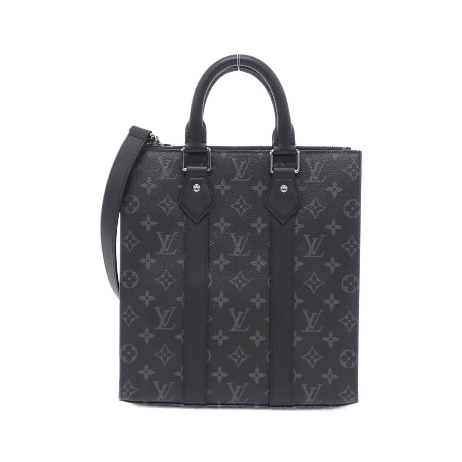 Canvas coated handbag Louis Vuitton: Canvas coated handbag Louis Vuitton This Louis Vuitton handbag features a coated canvas exterior in black, adorned with silver hardware. The bag measures 29cm x 26cm x 6cm and has some minor