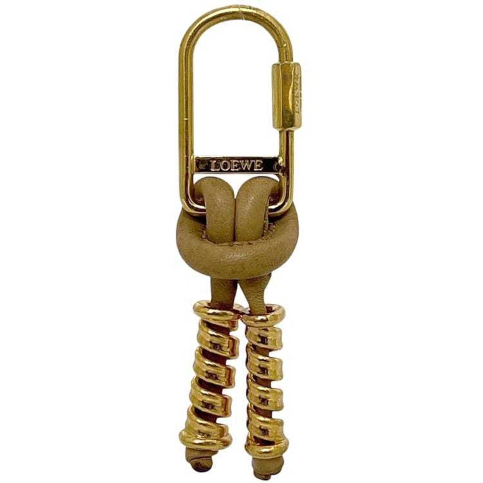 Loewe Keyring Gold Plating Leather Metal: Loewe Keyring Gold Plating Leather Metal Loewe Keyring Gold Plating Leather Metal features a unique combination of gold plating, leather, and metal in a classic design. The item boasts a brown color