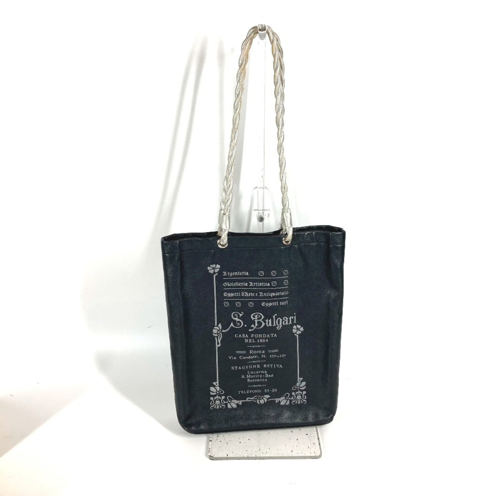 Bvlgari Shoulder Bag Tote Bag Leather: Bvlgari Shoulder Bag Tote Bag Leather Black leather Bvlgari shoulder bag tote with clean lines and classic design, measuring 27.5cm x 20cm x 5.8cm. The bag shows some signs of usage, including a few