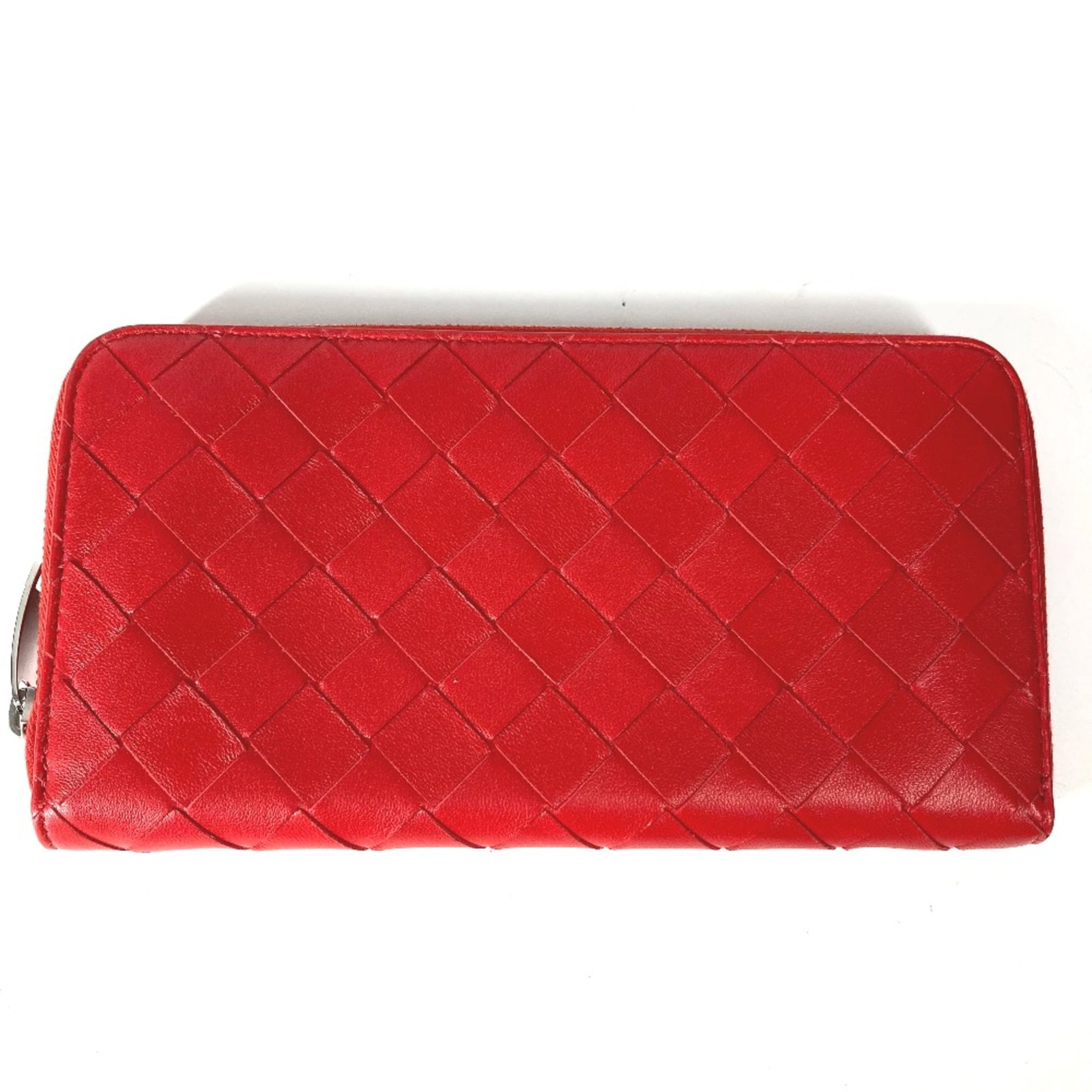 Bottega Veneta Long Wallet (Bi-Fold) Leather: Bottega Veneta Long Wallet (Bi-Fold) Leather Bottega Veneta's iconic bi-fold long wallet boasts sleek, red leather dimensions (W18.5cmxH9.5cm/W7.3xH3.7inch) that fit perfectly in a handbag or purse.