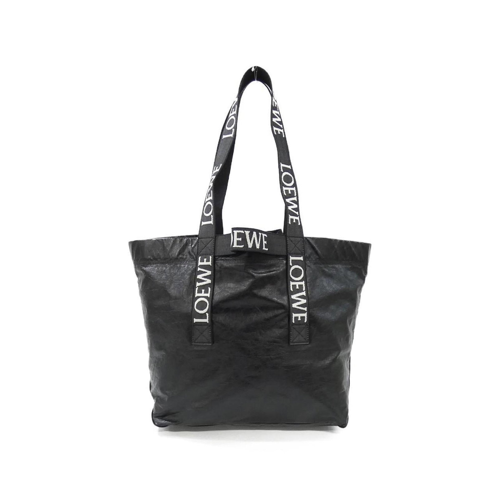 Handbag by Loewe: Handbag by Loewe Black Loewe handbag with dimensions 34cm x 50cm x 23cm, featuring a few traces of usage and some scratches/dirt. The bag is in very good condition overall, showing signs of