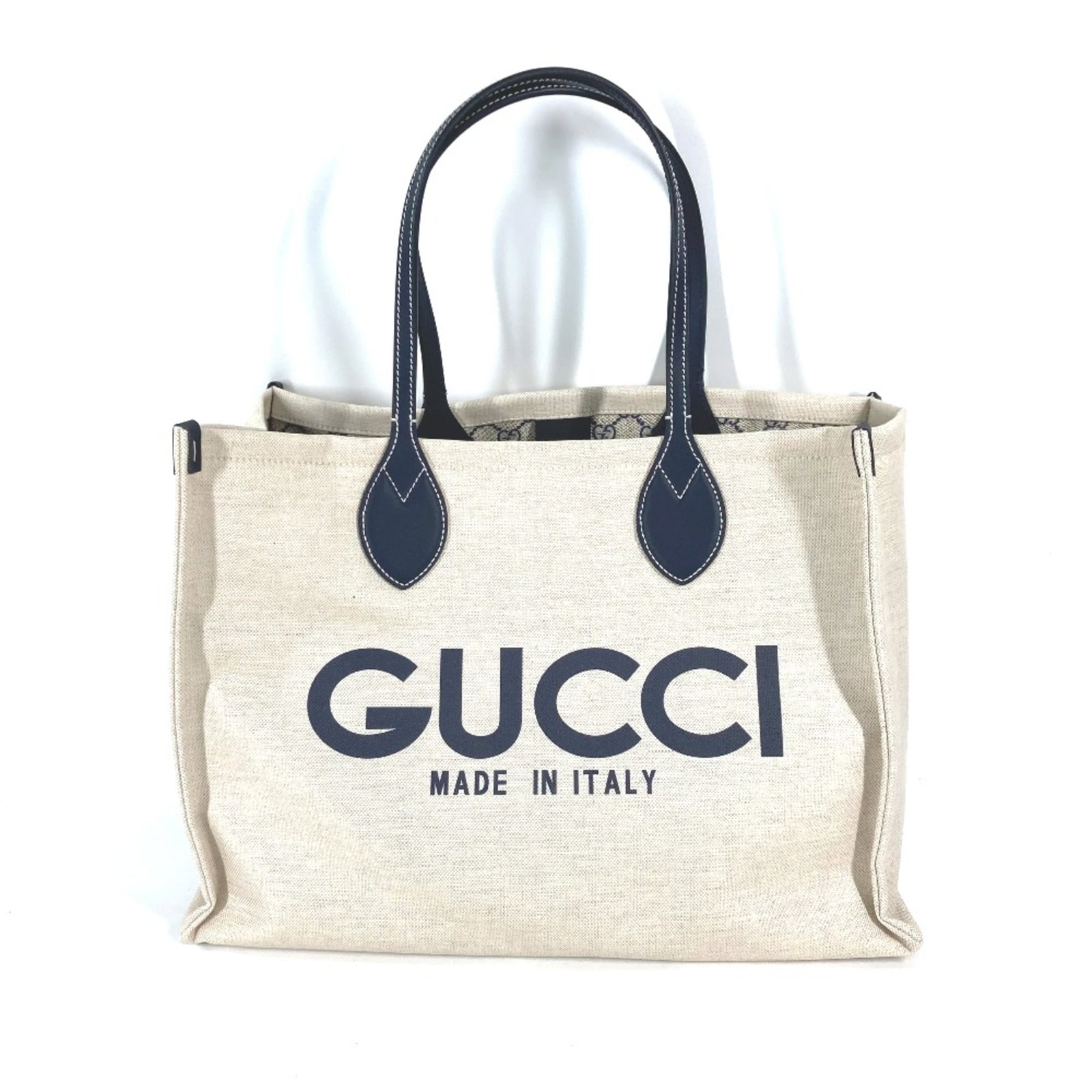 Other Gucci Tote: Other Gucci Tote Beige Gucci Tote Bag, W41.5cmxH29cmxD18.5cm/W16.3xH11.4xD7.3inch, Mint Condition. This used tote bag features a signature and is made from other materials. Catalog values are listed