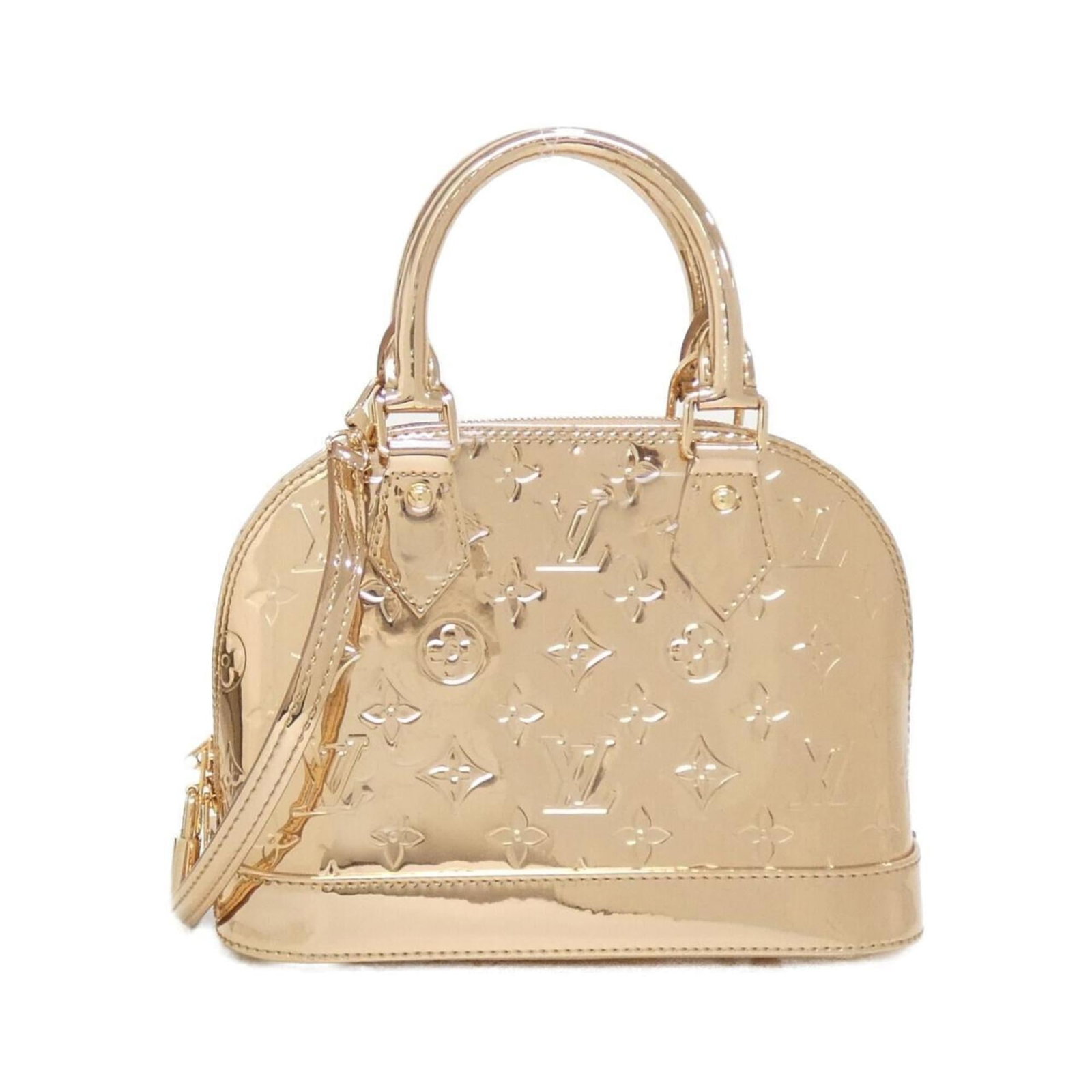 Handbag Leather Louis Vuitton: Handbag Leather Louis Vuitton This Louis Vuitton handbag boasts elegant rose gold hardware and features a beautiful, durable leather exterior. With its classic design and timeless style, it's perfect