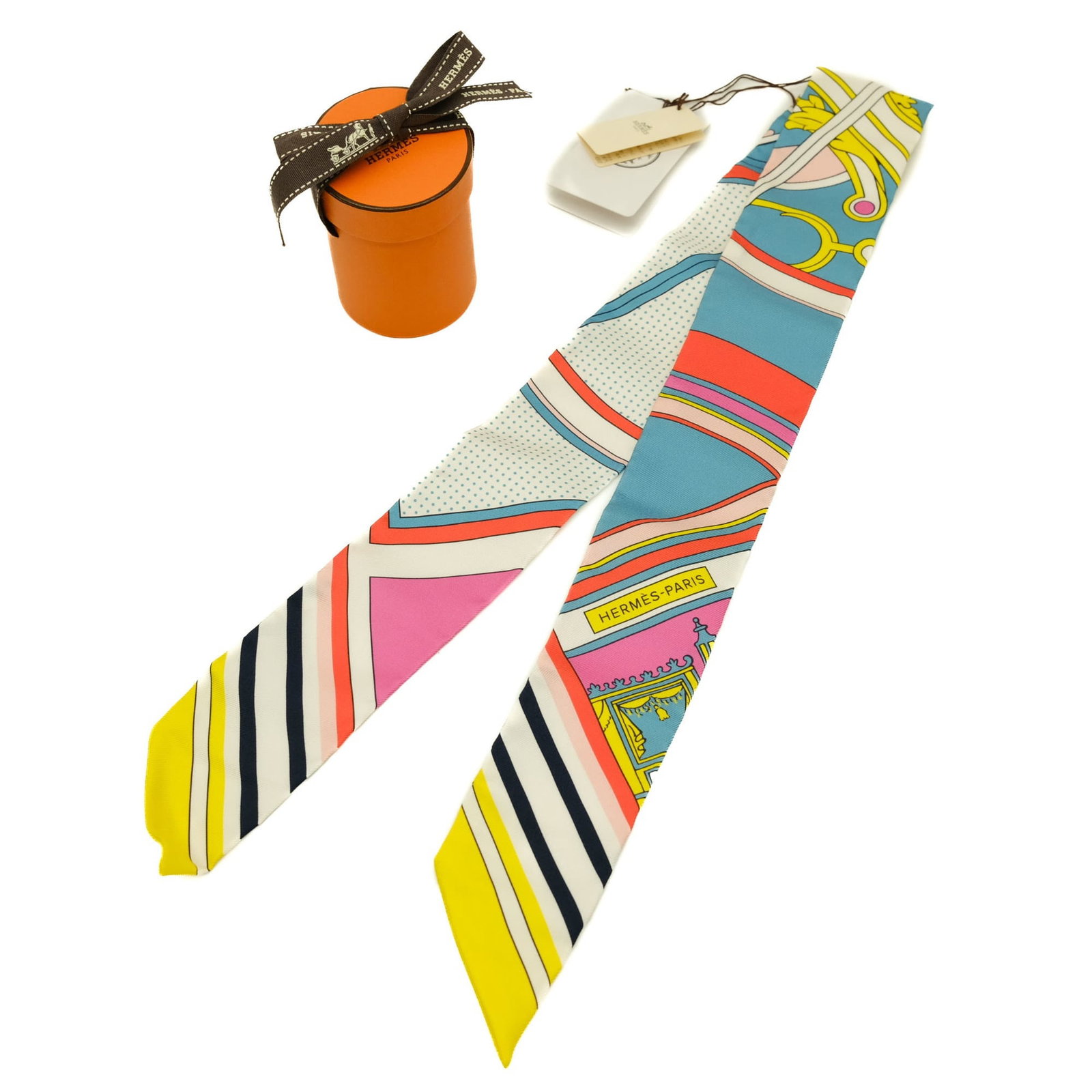 Silk Hermes Scarf: Silk Hermes Scarf Silk from the renowned French fashion house, this multi-colored Hermes scarf boasts vibrant hues and intricate design. Crafted from high-quality silk, its compact size makes it a ver