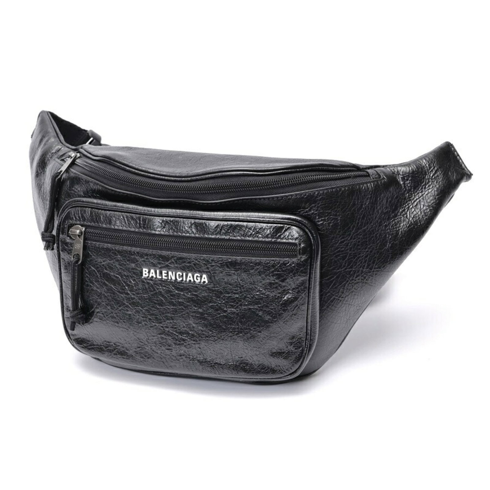Sling Bag Leather from Balenciaga: Sling Bag Leather from Balenciaga Black leather sling bag from Balenciaga, featuring a classic design with a few traces of usage visible. The bag's condition shows some scratches and dirt, but