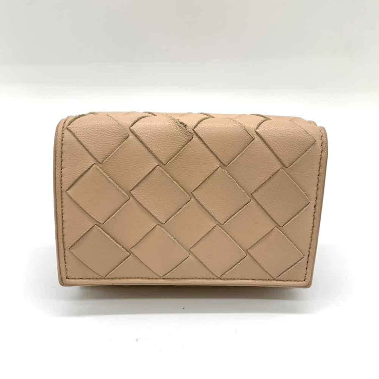 Bottega Veneta Wallet (Tri-Fold) Leather: Bottega Veneta Wallet (Tri-Fold) Leather This Bottega Veneta Tri-Fold Leather Wallet features the iconic brand's signature beige and Bordeaux color combination. With its classic tri-fold design, it sh