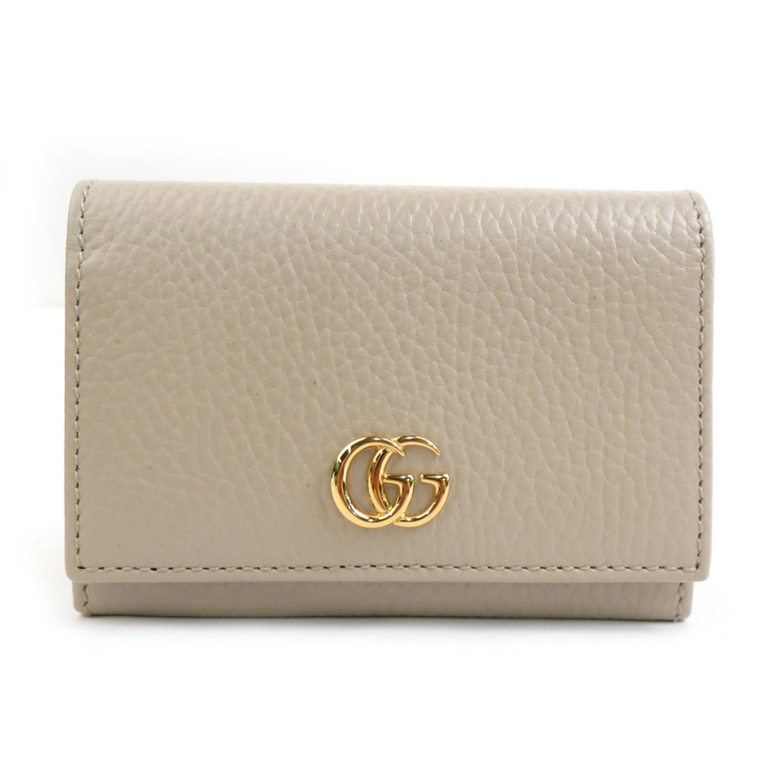 Gucci Card Leather Case: Gucci Card Leather Case This Gucci Card Leather Case boasts a timeless design in its classic beige hue, crafted from high-quality leather with a few subtle signs of wear. The case features a sleek