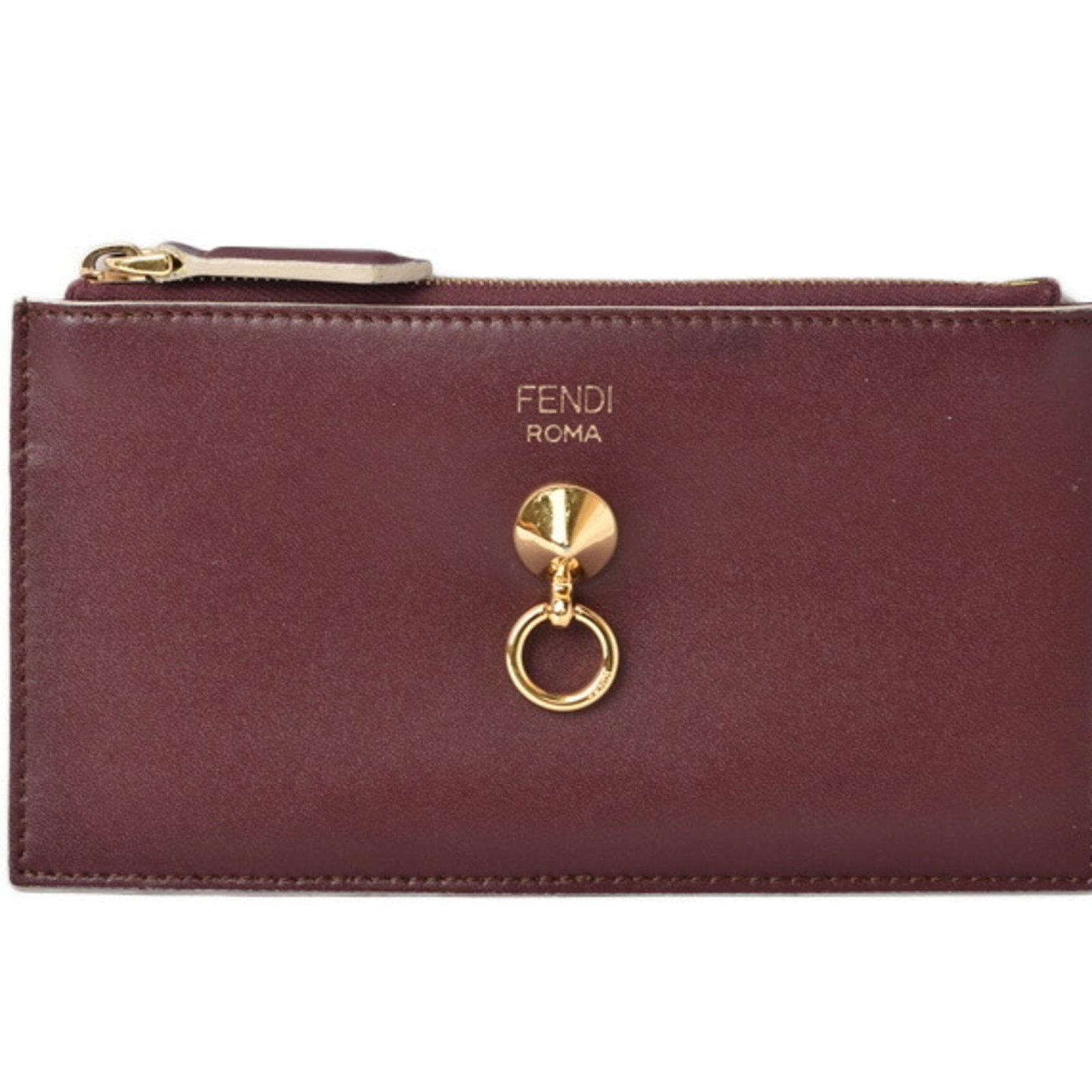 Coin purse leather case Fendi: Coin purse leather case Fendi Brown Fendi leather coin purse case, measuring 8.3cm x 15.85cm, features a classic design with a few traces of usage visible due to minor scratches and dirt. The